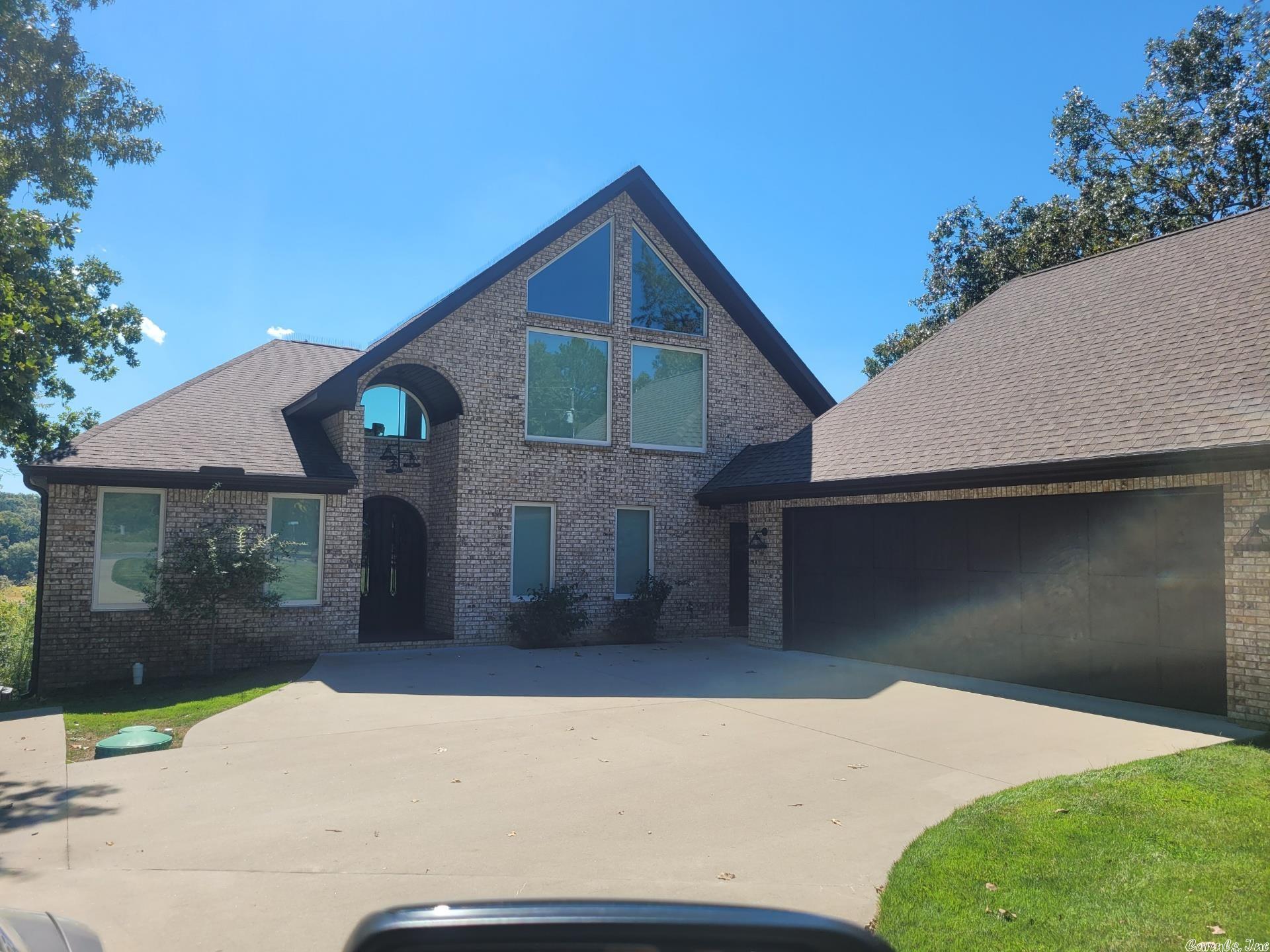 Beautiful upscale Lakefront home. Also comes with another lakefront lot with 2 boat slips with lifts and an airport lot with a 60 x 70 hanger.