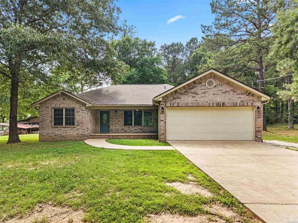 Beautifully updated and move-in ready! This fully brick 3 bedroom, 2 bath home offers comfort, space, and privacy all in one package. Inside, you’ll find brand new appliances, fresh neutral paint throughout, and new flooring through most of the home, creating a clean and modern feel that’s ready for your personal touch. This property is also located in Lake Hamilton School District.  Step outside to enjoy the partially fenced backyard — perfect for pets, gardening, or simply relaxing in the peaceful surroundings. The attached 2-car garage provides plenty of storage and convenience, while the adjoining vacant lot gives you an impressive combined total of approximately 1.13 acres.  Located in a quiet area with no POA fees, this property offers the freedom and tranquility so many buyers are searching for. Whether you’re looking for a full-time residence or a peaceful retreat near all that Hot Springs has to offer, 115 Blackbeard Drive is a must-see!