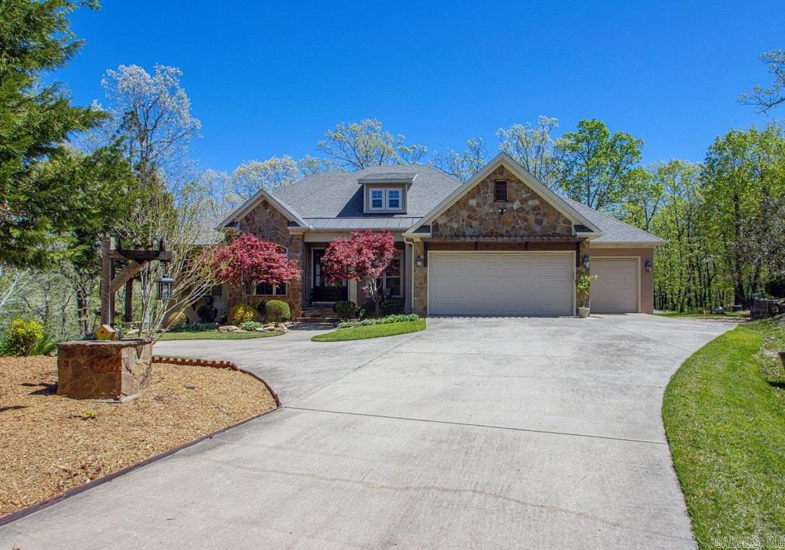 Beautiful custom home with panoramic views nestled in the woods outside of West Little Rock. This custom 4 bed, 3 bath home on 3+ private acres is the kind of place that's hard to leave.  Step inside to wood beams, a massive rock fireplace, a dream kitchen with double ovens where true custom craftsmanship set the tone.  Also enjoy your walk in pantry, private office, theatre room and built in safe room.   Outside, 800 square feet of covered deck with its own fireplace and panoramic hill views make every evening feel like a getaway.  Also has a 3 car garage, floored attic, circle drive and so much more.  This is a must see!