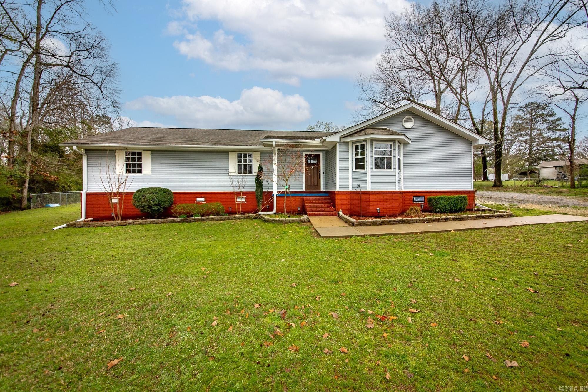 VERY MOTIVATED SELLER! Bring an offer! Cute and convenient! Welcome home to 90 Hwy 46 N, located just 6 minutes from downtown Sheridan and 40 minutes from Benton and Pine Bluff. Sitting on 1.21 acres, enjoy your space while being close to all the amenities of town. Boasting a huge walk-in pantry, beautiful maple cabinets, a wood burning fire place, vaulted living room ceiling, 2 car garage, and a fenced in back yard! 3 bed, 2 bath, 1648 Sq ft. Sheridan School District, and the perfect place for your family.   Home is a short sale and offers are subject to bank approval.   AGENTS SEE REMARKS