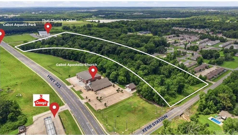 Exceptional opportunity to acquire ±15 acres in a growing area of Cabot. With approximately 204 feet of frontage on Highway 321 and approximately 384 feet of frontage on Kerr Station Road, this primarily C-2 Commercial tract offers outstanding accessibility, visibility, and development potential.  The property is largely wooded, providing a natural setting and flexibility for future development. Utilities already available on-site. Conveniently located near the Cabot Aquatic Park, area schools, established residential communities, and ongoing commercial development, this property is positioned in an area experiencing continued growth and investment.  The property's size, location, and commercial zoning may be well suited for a variety of potential uses, including professional office space, medical or wellness services, business services, retail opportunities, and other development permitted by local regulations.  Large commercial tracts with dual-road frontage and this level of accessibility are increasingly rare. Don't miss the opportunity to secure a premier development site in a growing area of Cabot.  Tax records should be independently verified by the buyer.