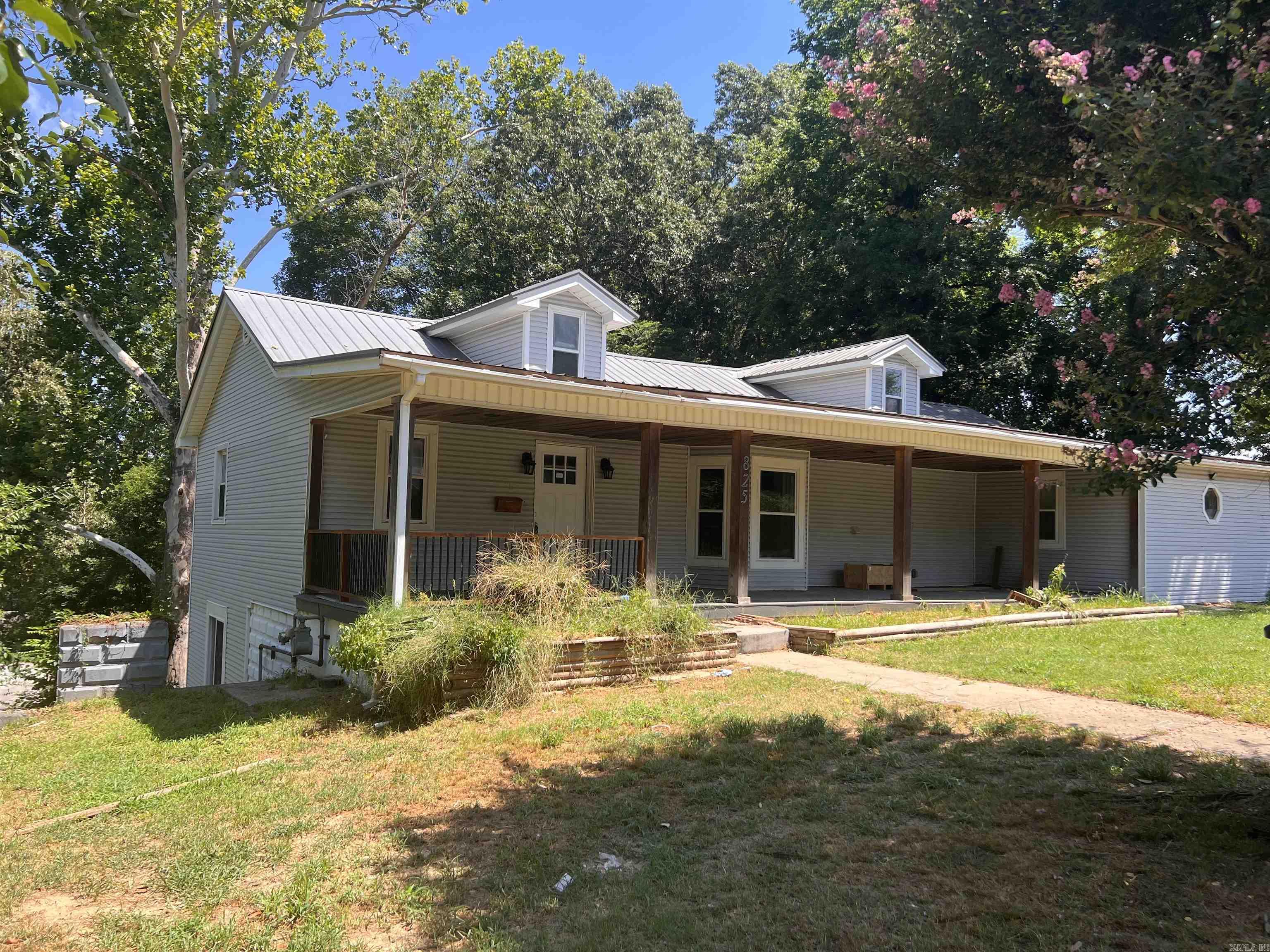 Check out this 3 bed, 2 bath 1.5 story home sitting on two lots situated in the heart of downtown Benton! At 2409 sq ft you have enough room to spread out and enjoy the area. Big beautiful covered front porch to sit and enjoy your coffee. Each of the bedrooms has a cedar closet and are all on the main floor. Original hardwood floors. Washer, dryer, and commercial grade refrigerator convey with home.