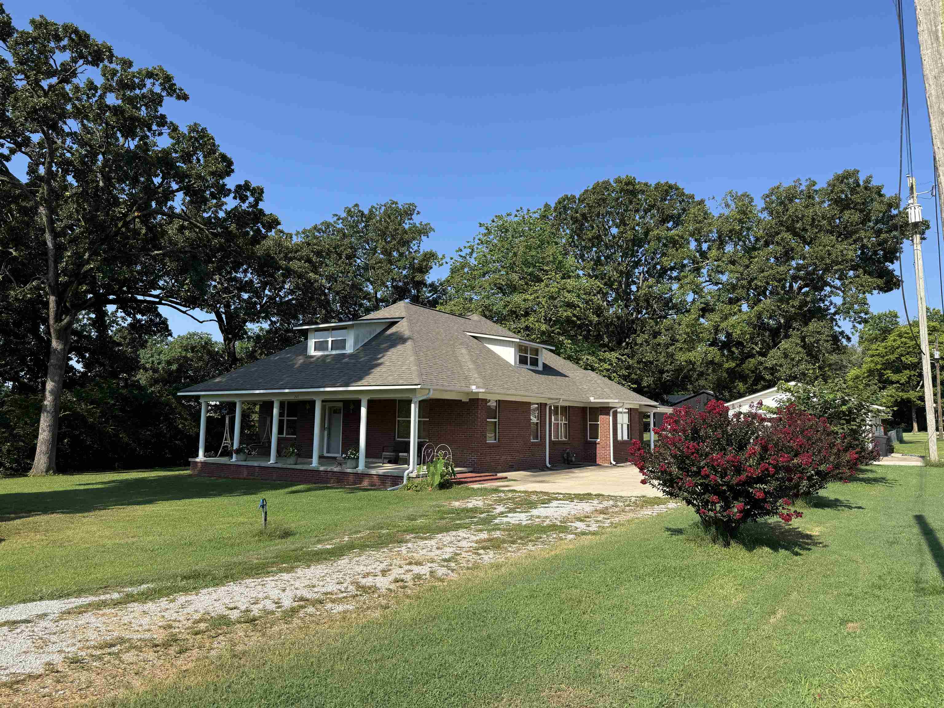 Welcome home to this beautifully updated country-style home in the heart of Imboden, offering the perfect blend of small-town charm and modern convenience. Located next to the city park, this spacious home features approximately 2,816 square feet with 4 beds and 3 full baths, providing plenty of room for family and guests.  Thoughtfully renovated over the past 10 yrs, the home boasts a custom kitchen, granite countertops with soft-close cabinets and drawers, a pantry, and a full suite of new appliances installed in 2021. The main level offers approx 2,256 sq ft and includes 2 bed, 2 baths, a formal dining room, office, laundry room, and a cozy breakfast area adjacent to the kitchen. Upstairs, you'll find approx 560 sq ft featuring 2 additional bedrooms, a full bath, and a comfortable sitting area.  Beautiful hardwood flooring enhances the dining room, living room, and hallway, while the covered front and back porches provide the perfect spaces to relax and enjoy the outdoors. The fenced backyard offers privacy and room for pets or play, and the detached two-car garage and separate tool shed provide excellent storage and workspace. New roofs 2023. Generous space, & Great Location.