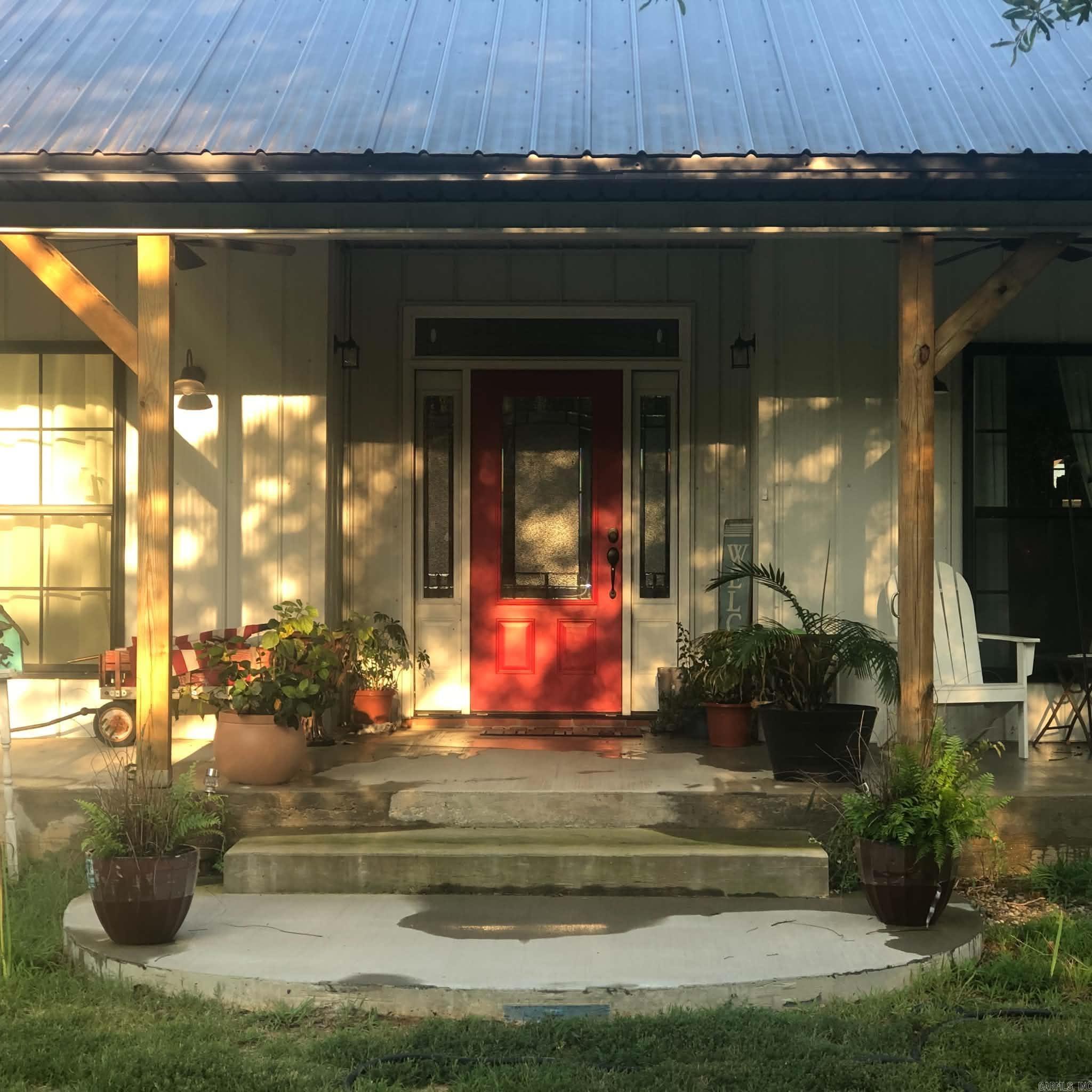 Beautiful Custom home/lodge on 2.25 acres minutes from World-Class Arkansas Duck Hunting. Wonderful home finished in 2022 with lots of energy saving features in this well-built home! Just a couple minutes to duck hunter’s paradise.  Quartz counters with pull outs and soft close cabinets in the custom-made kitchen. Large main bedroom with dressing room and large main bathroom with double quartz sinks, big soaking tub and walk in tile shower.  Home sits on over 1.5 acres in the country.  Very peaceful setting with lots of mature trees and landscaping.  Garden spot in the back yard with RV cover and hook-up.  Storage building to keep all you outside tools.  Oversized garage with plenty of room for storage along with overhead storage.  Unique features throughout of this well-planned country home.  Let's make an appointment and see this one soon. 17 miles to Stuttgart and just minutes to duck hunter's dreams.  Storage building for boats, decoys or ATVs.  Fishing places close by.