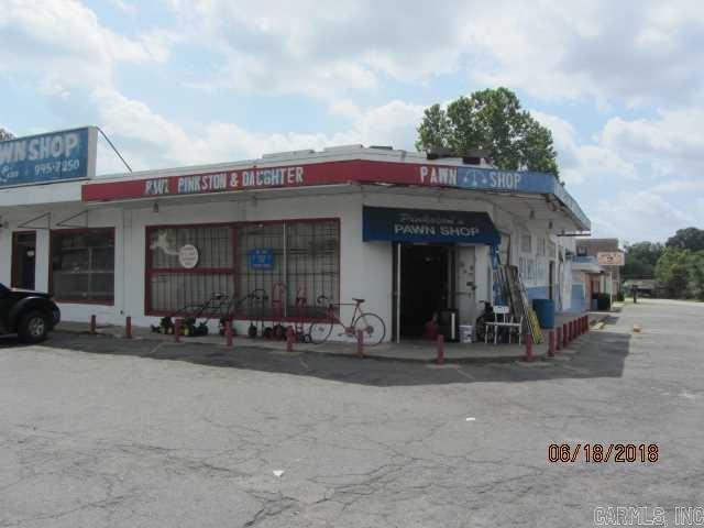 Building & Land For Sale! CORNER LOT! ALL CONTENTS INSIDE TO CONVEY! Zoned C-2. Great opportunity For potential of gas station or whatever desired! SEE Remarks.