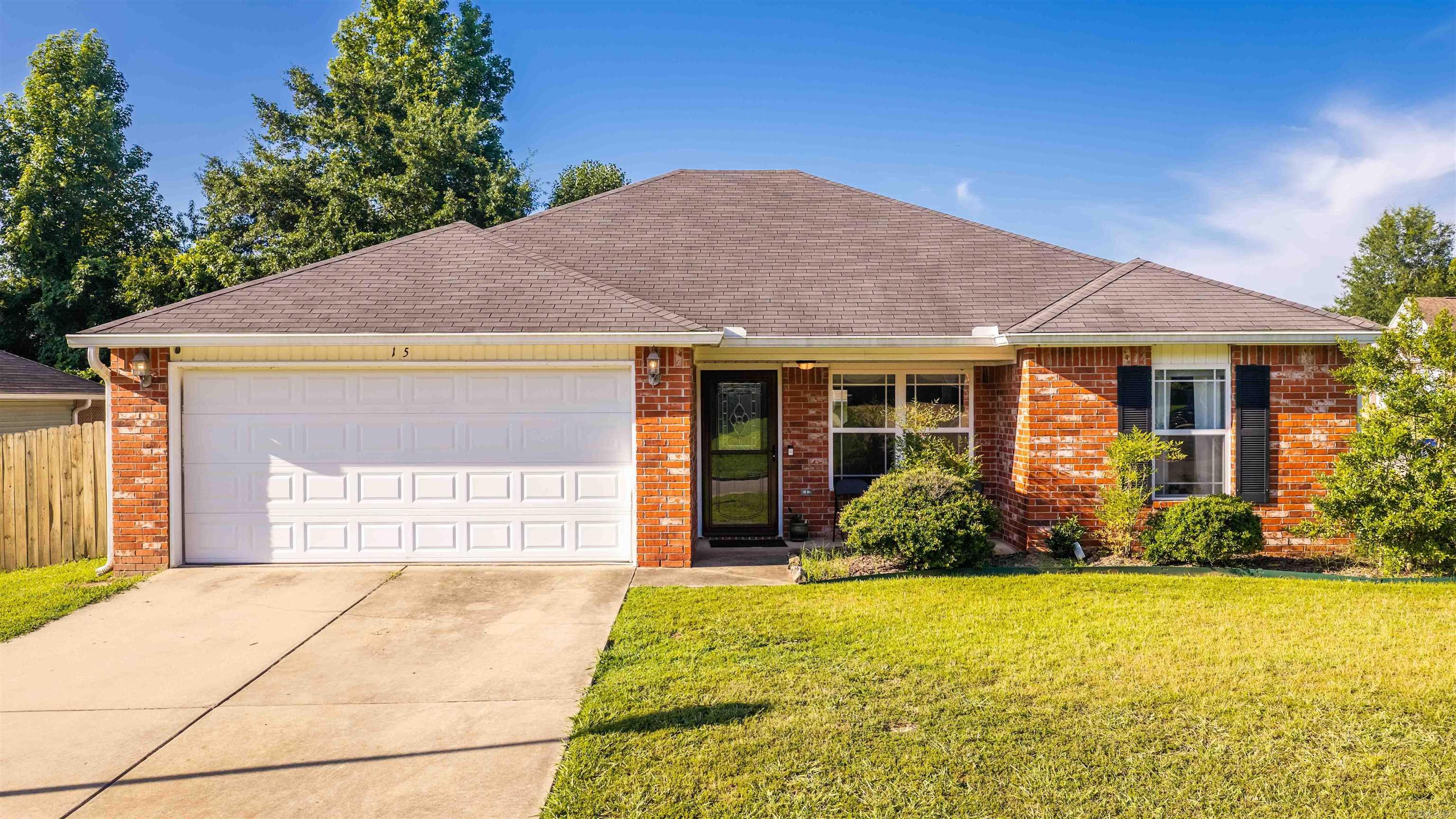 Welcome to one of Alexander's most desirable neighborhoods! This well-maintained home features a spacious split floor plan, and a large kitchen with a breakfast bar that's perfect for everyday living. Separate laundry room and pantry add amble space for life's extra things. Situated on large coroner lot, the property offers convenient side access through a 12 -foot double gate, providing room for a boat, trailer, or easy riding lawnmower access. A large storage building with metal roof adds valuable storage and workspace. Great opportunity to own a home that combines comfort & style! Make a showing appointment today!