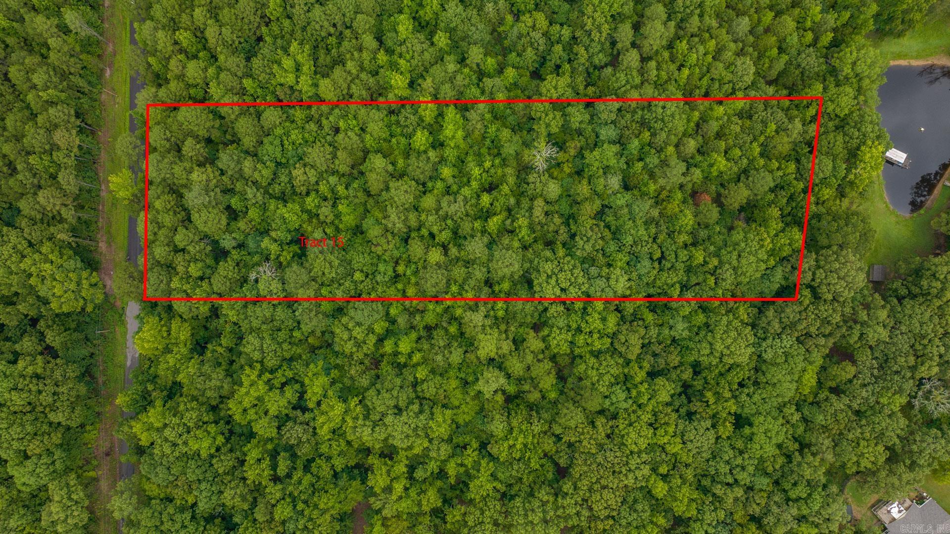 New Subdivision in Greenbrier. All of the lots are wooded. This would be the perfect location to build your home nestled in the woods and have complete privacy from your neighbors. Barndominiums will be allowed here. 1500 sq. ft. minimum. Mobile homes not allowed. Red lines on photos are an approximation of boundary lines. This listing includes Tract 15 and 16.