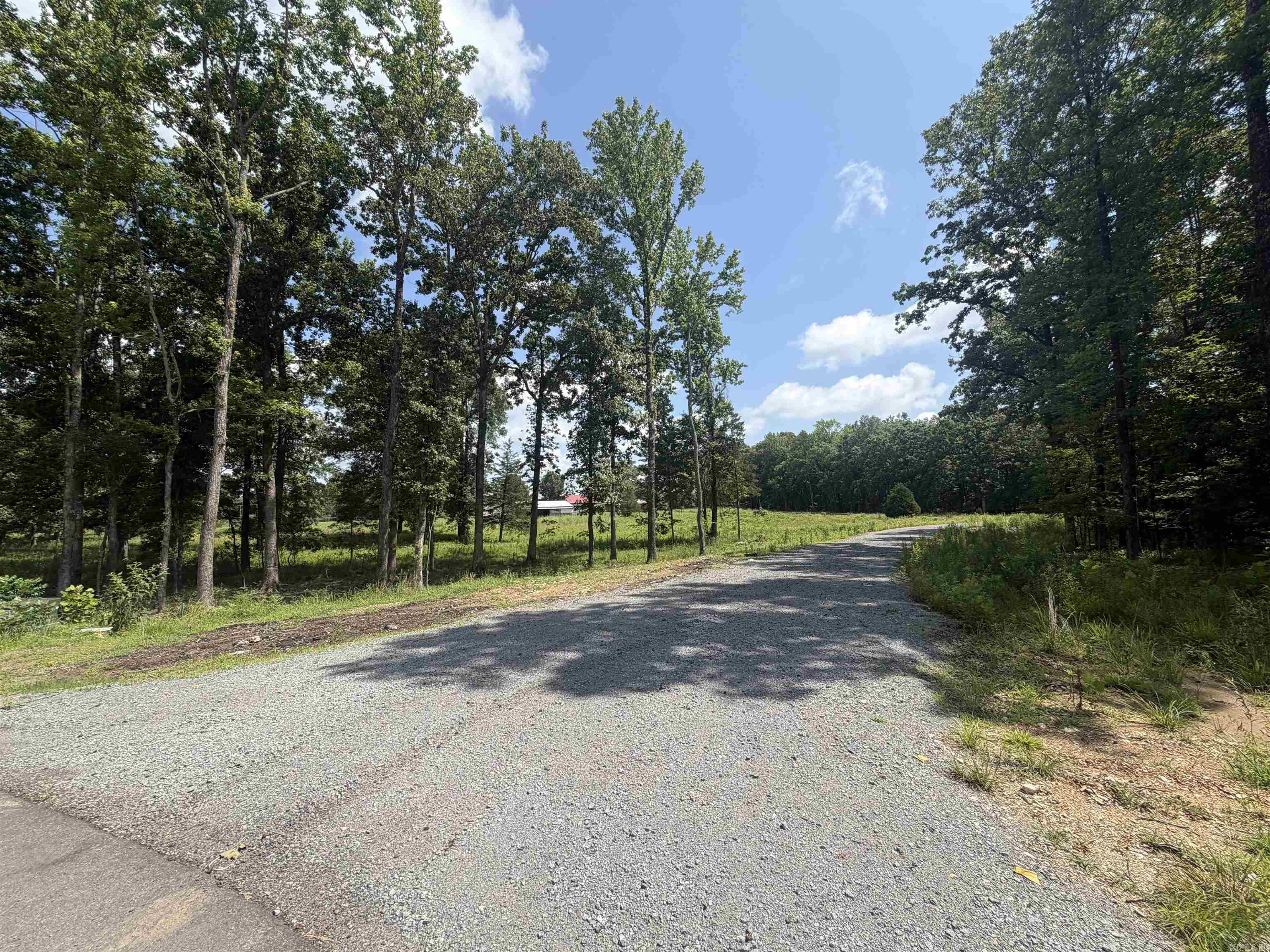 This lot checks every box. Nestled at the end of a quiet cul-de-sac, this expansive 2.95-acre parcel offers privacy, space, and a head start on construction with a driveway already in place, saving you time and money. With nearly 3 acres to work with, you'll have room to design the home you've always envisioned — whether that's a sprawling estate or a home with a workshop, pool, or hobby space. The cul-de-sac setting means minimal through traffic, making it an ideal spot for families and anyone who values peace and quiet. Avilla Manor is one of the area's premier places to live and with only a handful of lots left, you don't want to miss this opportunity to make your dream home a reality.  Contact us today.