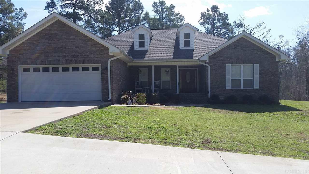 Everything like NEW! 5BR on 11 acres close to the interstate for easy commute! Large Pond is stocked with Bass, Crappie & Catfish* You will love this beautiful kitchen with granite & stainless steel appliances - Fridge stays. Master BR has french doors opening to back deck, master bath has large walk in shower with 2 shower heads, whirlpool bathtub, 2 sinks & granite countertops! BR 5 upstairs is large & can also be a GAMEROOM. Home was Finished out & Remodeled in 2012! Back deck w/ Gorgeous View. SAFE ROOM