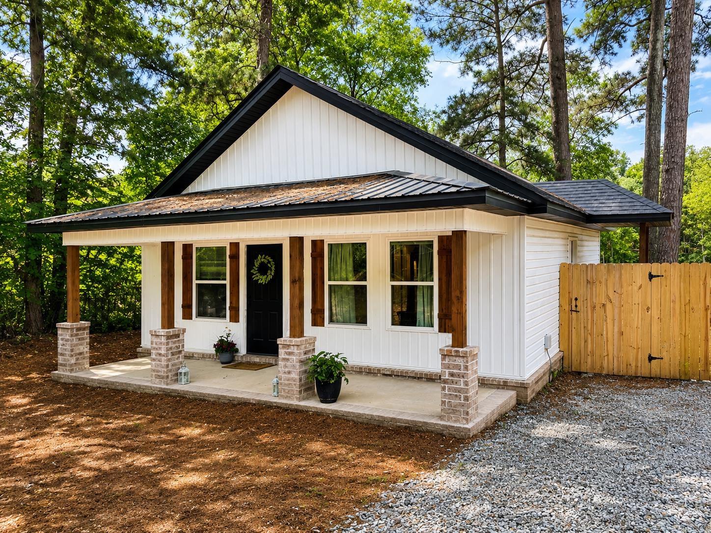 Well-maintained 1-bedroom home built just 6 years ago and kept in excellent condition. Conveniently located close to town with city sewer. Features architectural shingles with a black metal accent roof over the front porch, luxury vinyl plank flooring throughout, and low utility costs. Inside you’ll find a walk-in closet, separate laundry area, spacious bathroom, and quality craftsmanship throughout. Private drive, easy maintenance, and plenty of character make this a standout property. The loft is included in the square footage.   The seller recently built a privacy fence and repainted the entire inside.   This is one of those that would be cheaper to buy than to rent!