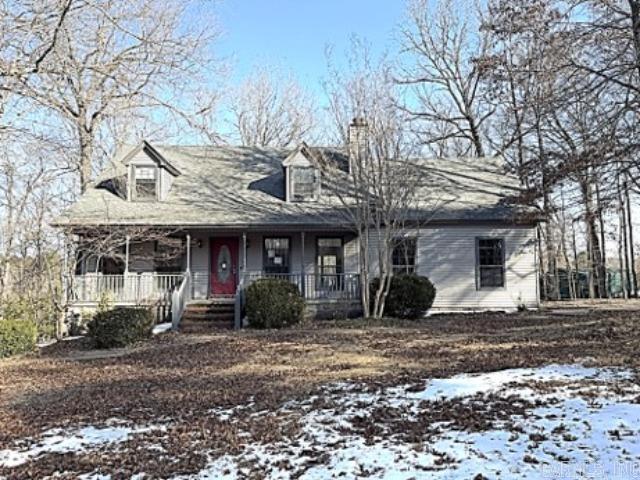 Conveniently located in Alexander, AR with easy access to Little Rock, Benton, and nearby shopping, dining, and everyday amenities, this well-designed home offers a functional layout with flexible living space both indoors and out. The lower level features a front entry that opens into the living room and flows into the dining area. The kitchen is located just off the dining space, with a nearby laundry room, half bath, and access to the two-car side-entry garage. Double sliding doors from the dining area lead to a multi-level deck overlooking the backyard, creating a seamless extension of the living space. The primary suite is located on the main level, providing convenience and privacy. Upstairs, three additional bedrooms and a full bathroom complete the layout. With a thoughtful floor plan and a location that balances comfort and accessibility, this home offers a great opportunity in Central Arkansas.