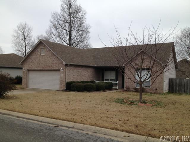Impressive home with 9' ceilings & many cosmetic updates including lighting, plumbing fixtures, paint and floor coverings. Spacious living area with fireplace and large master with walk-in closets. 2 additional bedrooms are separate.   Two car garage, lovely landscaping and fenced backyard with deck!  Credit report acceptable to owner is required. Deposit required. TO SHOW CALL LISTING AGENT:  501-831-1559
