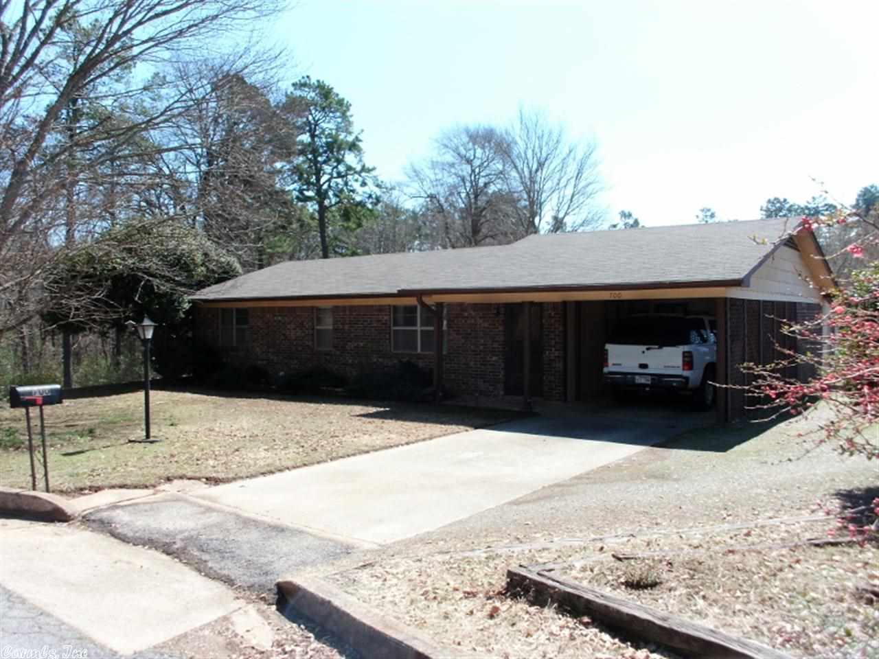 Lovely 3 bedroom, 2 bath brick home on a peaceful cul-de-sac.  Central heat and air, one car carport, large closets and lots of cabinet space.  Covered patio off of closed in sunroom.  There is a detached deck, 13x19 shop and additional covered RV/carport.  Prairie Creek runs along edge of property.  Privacy fence in back.  Home subject to tenancy.Agents please see remarks!