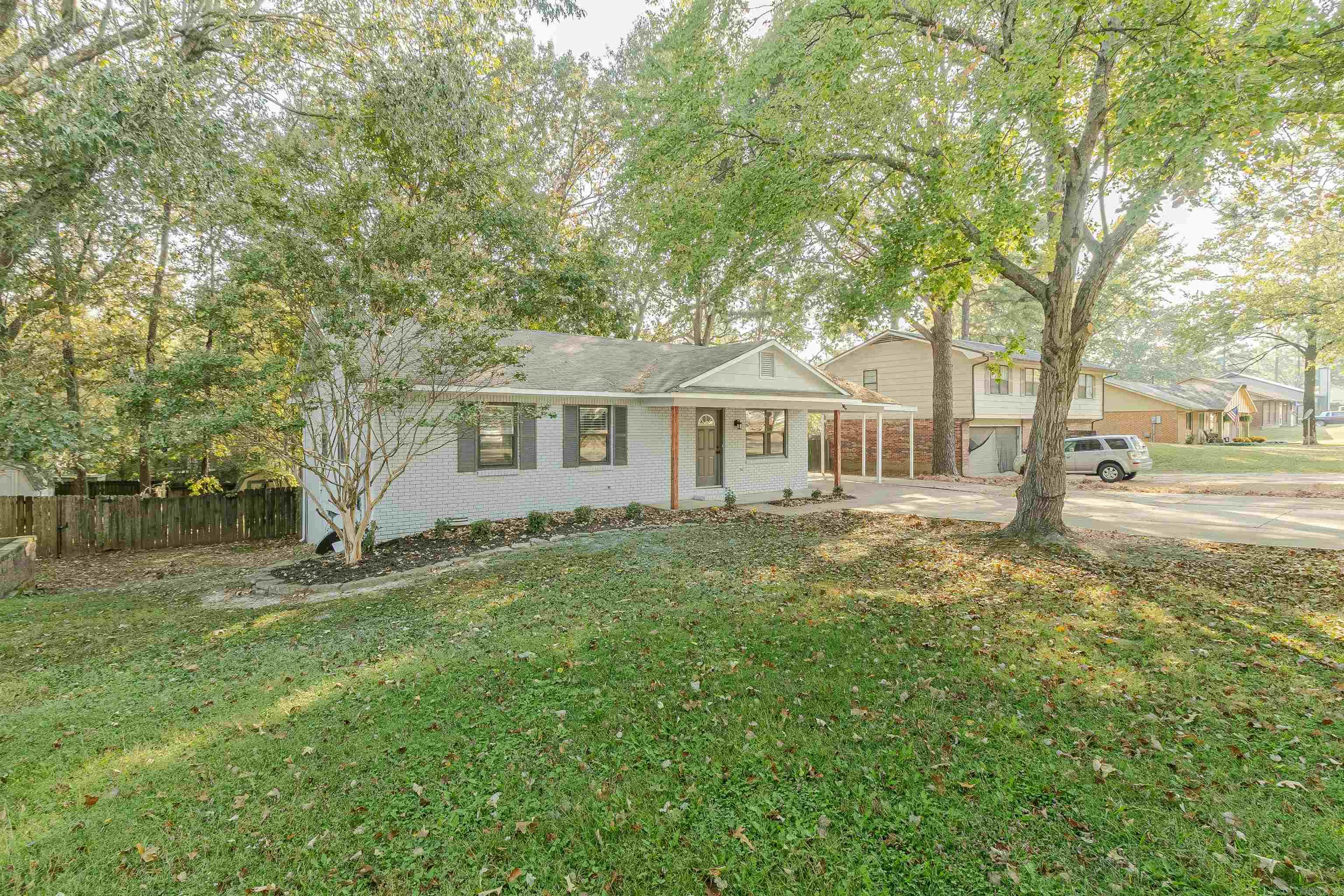 This move in ready home features a brick exterior with beautiful landscape, 4 bedrooms, 2 bathrooms, luxury vinyl plank flooring, updated kitchen cabinets and countertops, fresh, neutral paint throughout, and a large deck overlooking the back yard. It is located in a quiet and established neighborhood, making it the perfect home for you and your family.