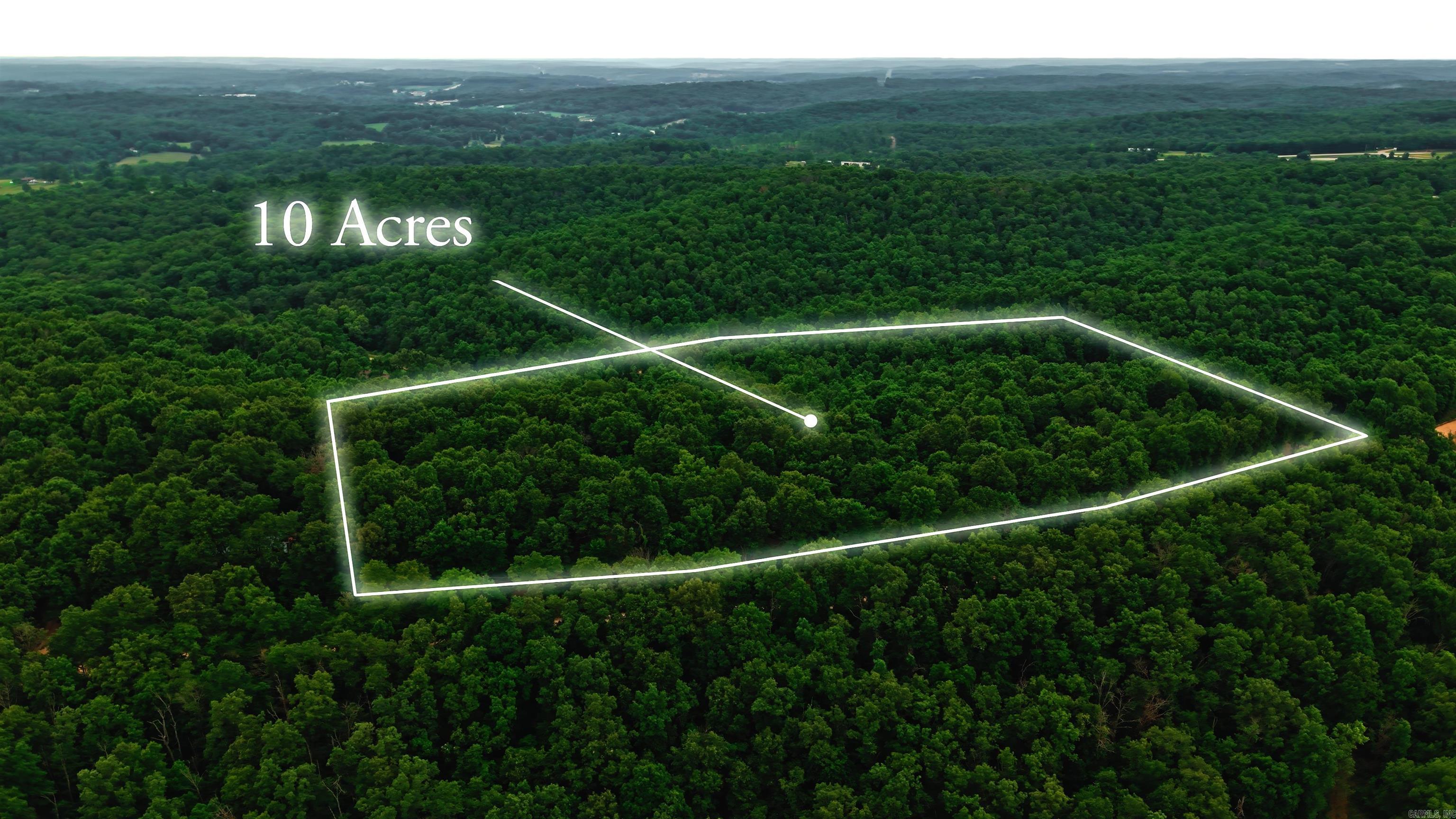 10 Acres Near the Spring River with Well & Building Site  Beautiful 10-acre tract located near the Spring River offering privacy, wildlife, and an excellent opportunity to build your dream home or getaway cabin. This mostly wooded property features a healthy mix of young and mature timber, creating both scenic beauty and excellent habitat for deer, turkey, and other native wildlife.  The land offers a great building site along with a private well already in place, helping reduce future development costs. County road frontage provides convenient access, while the established circle drive entrance welcomes you onto the property.  Outdoor enthusiasts will appreciate the property's close proximity to the Spring River, known for outstanding fishing, floating, kayaking, and recreation. Whether you're looking for a hunting property, future homesite, weekend retreat, or investment in Ozarks land, this tract offers the combination of privacy, natural beauty, and accessibility that is becoming increasingly difficult to find.