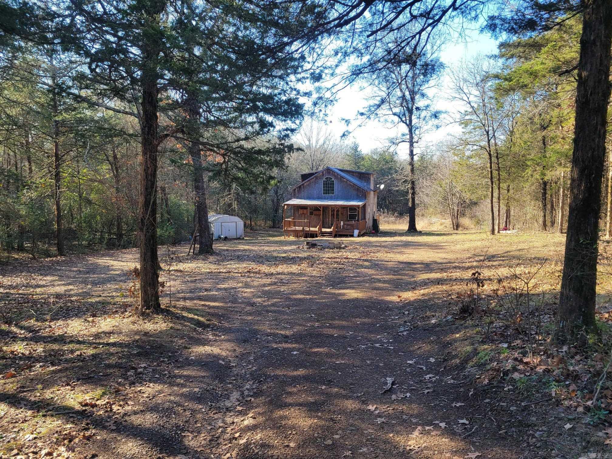 HUNTING/CAMPING AT IT'S BEST. PROPERTY IS BEING SOLD "AS IS" NO WARRANTY NOR DISCLOSURE AVAILABLE. PROPERTY HAS BEEN USED AS A DEERCAMP, BUT YOU CAN FINISH AND MAKE A RESIDENTIAL RETREAT, IT DOES HAVE A CREEK THAT RUNS THROUGH THE PROPERTY. WOODED, VERY PRIVATE AND SERENE. MUST SEE TO APPRECIATE.
