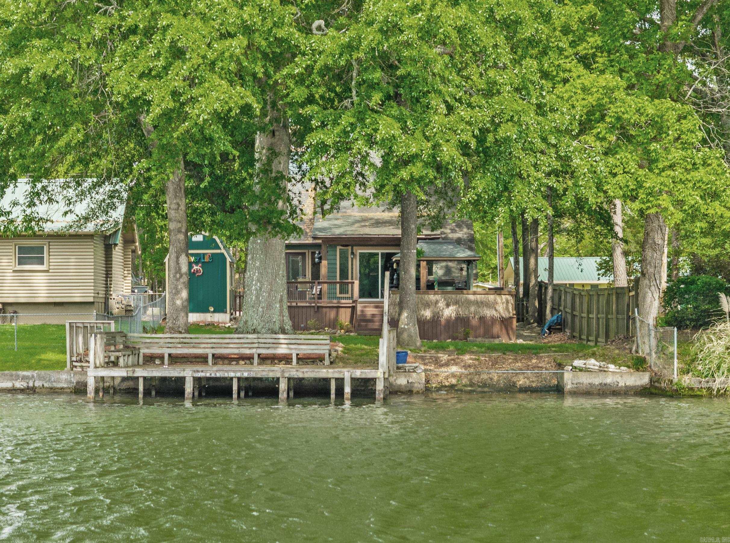 This Great Main Channel Bungalow packs a lot of punch! 3 Bedrooms, 2 full baths, a compact but well appointed kitchen with all the upgrades and a flat level lot to enjoy it all! The exterior includes a fabulous deck to enjoy watching the boaters, a hot tub to enjoy the evenings and a lakeside patio for year round fishing!