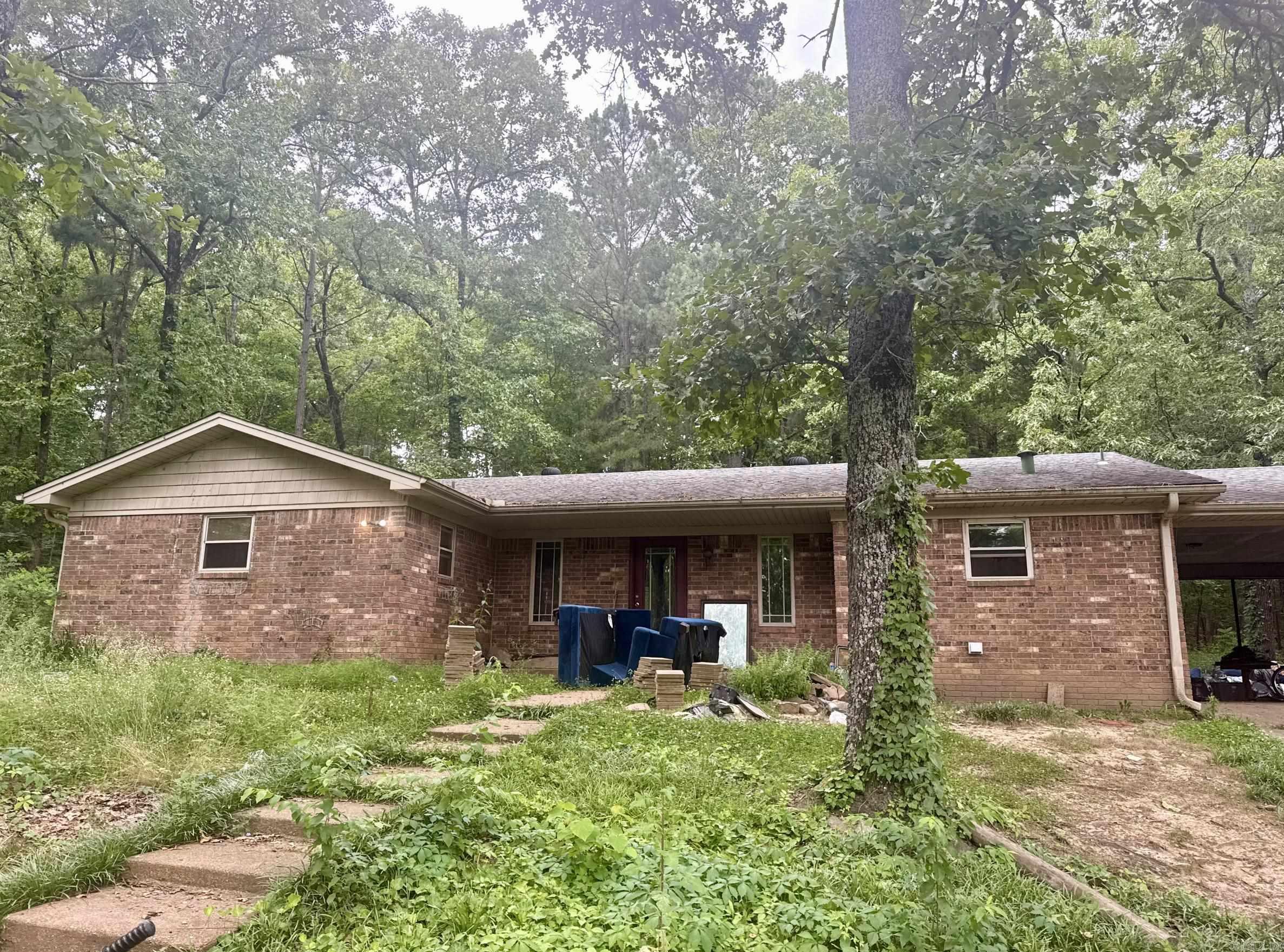 INVESTOR OR FIXER UPPER OPPORTUNITY - ON 7 ACRES! Rare opportunity to own a home with land in the Searcy area at an attractive price point. Whether you're looking for a renovation project, investment property, or a place to build equity, this property offers tremendous potential. The existing home needs repairs and updates and is being sold AS-IS, but the acreage provides value, privacy, and plenty of room for future possibilities.  Bring your vision and transform this property into something special. Opportunities to purchase acreage at this price are becoming increasingly difficult to find. AGENTS - SEE REMARKS