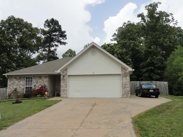 This is one to see. Vaulted ceiling in great room gives room that large feeling.  Great floor plan. Kitchen has lots of cabinets and breakfast area. Master is large with nice bath and closet. Other two bedrooms are spacious.  Good size backyard and an extra parking pad!!