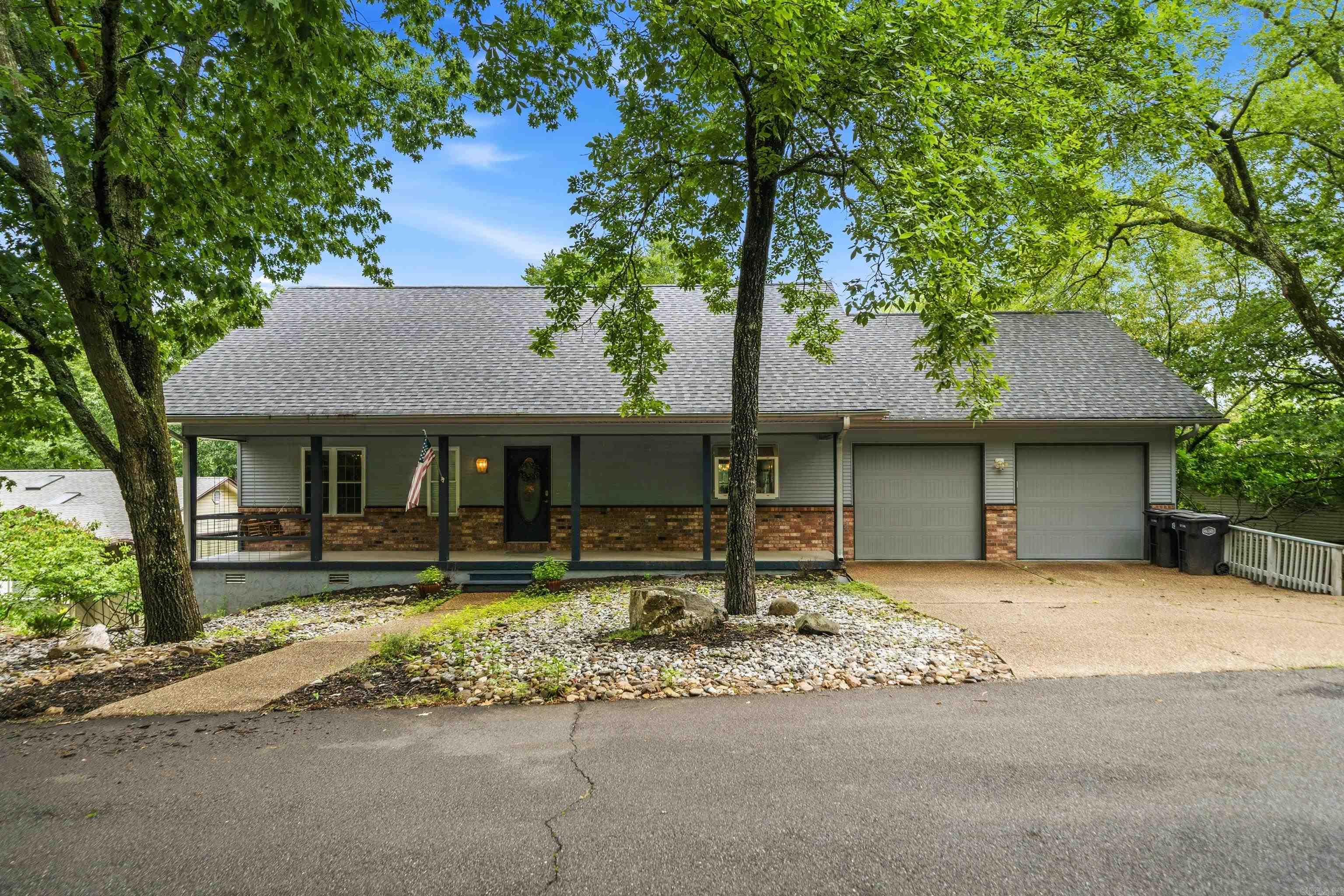 Enjoy waterfront living on beautiful Lake Coronado! This 3-bedroom, 2.5-bath home offers approximately 2,476 sq ft of living space on a 0.47-acre lot with a private dock and stunning lake views. Features include vaulted ceilings, warm wood accents, a main-level primary suite, multiple living areas, and a 2-car garage. Conveniently located near Coronado Golf Course, fitness facilities, walking trails, and all the amenities of Hot Springs Village. Ideal as a full-time residence, vacation retreat, or investment property. ?????