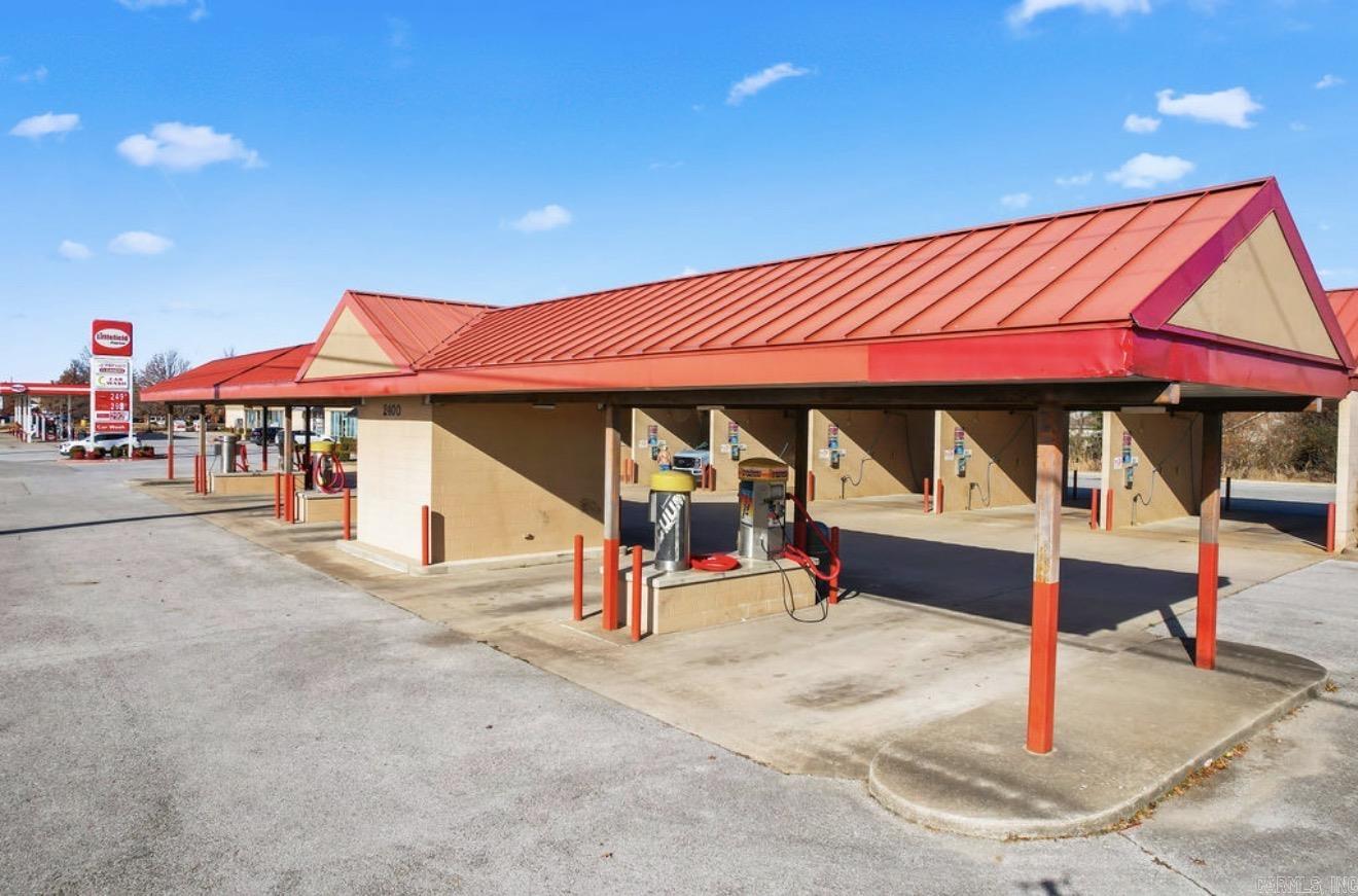 Prime commercial opportunity in a high-traffic Bentonville location! This approximately 4,608 +/- SF building sits on 1.00 +/- acre and offers approximately 25 parking spaces, excellent visibility, and convenient interstate access. The level corner lot and versatile building provide endless possibilities for retail, office, restaurant, service business, or other commercial ventures. Don't miss this exceptional investment opportunity