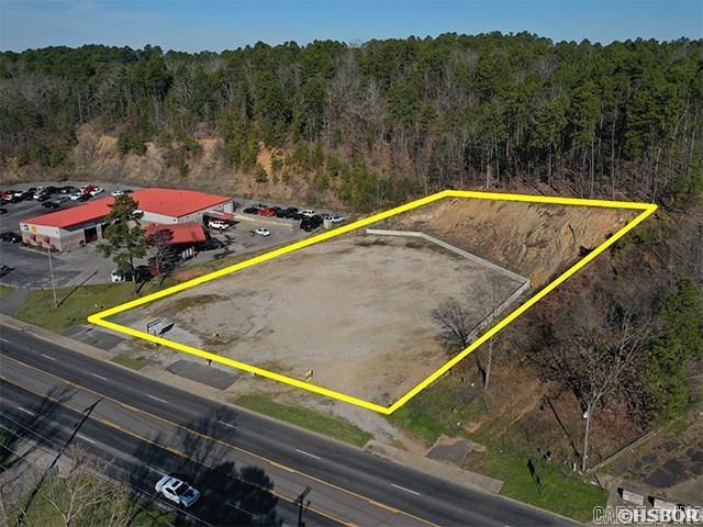 Prime & Ready for Development - This high-visibility commercial tract offers exceptional potential to elevate or expand your business. Encompassing approximately 1.2 acres with an impressive 222 feet of highway frontage, the property delivers outstanding access and exposure. Positioned along a heavily traveled corridor with a daily cross traffic count of nearly 61,000 vehicles, it presents a compelling opportunity for strong visibility and sustained growth.