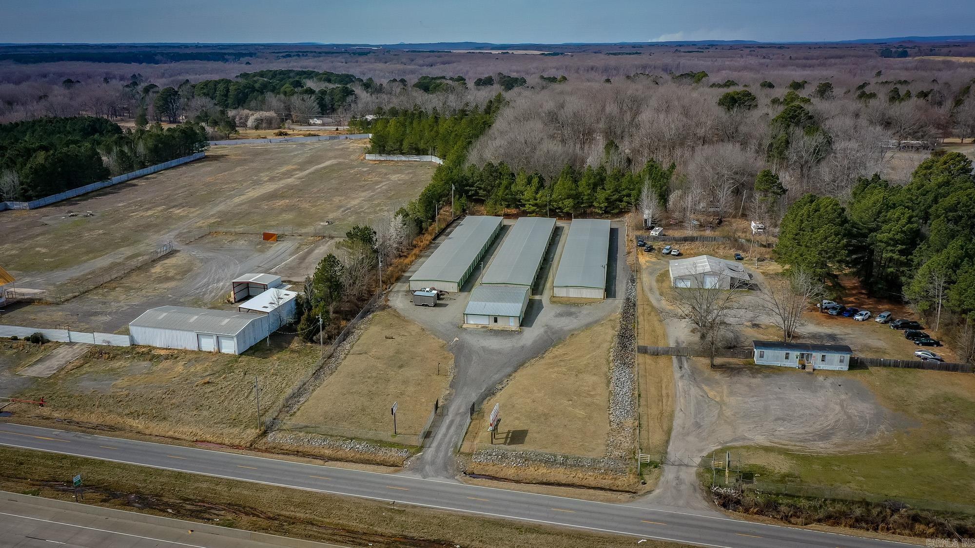 Established one owner mini storage business ready for a new owner. Joe's Mini Storage sits on over 3 acres on I-57, has three buildings with various sized units and has outside storage as well. There is an office and apartment space plus warehouse. Over 38000 sq ft for rentable income. Parcel is fully fenced too. Call listing agent for income and expenses.