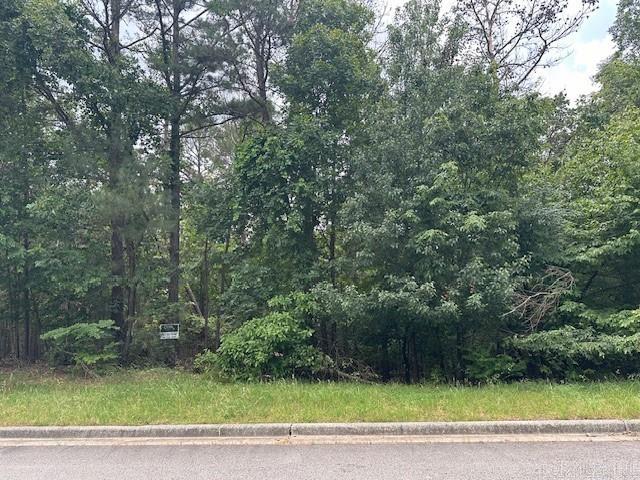 GREAT BUILDING SITE IN THE PREMIER GATED COMMUNITY OF HOT SPRINGS - RED OAK RIDGE .  SITUATED ON 800 ACRES.  ENJOY SERENITY AND PEACEFULNESS WITH LAKE AND MOUNTAIN VIEWS WITH SOME OF THE LOTS.  PAVED WALKING PATHS ALONG THE LAKE FRONTS OF THE TWO PRIVATE RED OAK RIDGE SPRING FED LAKES - STOCKED WITH BASS FOR FISHING - ALONG WITH SMALL BOATING ACTIVITIES. ENJOY MOTHER NATURE AT ITS BEST!  GREAT LOCATION  CLOSE TO ACTIVITIES!!