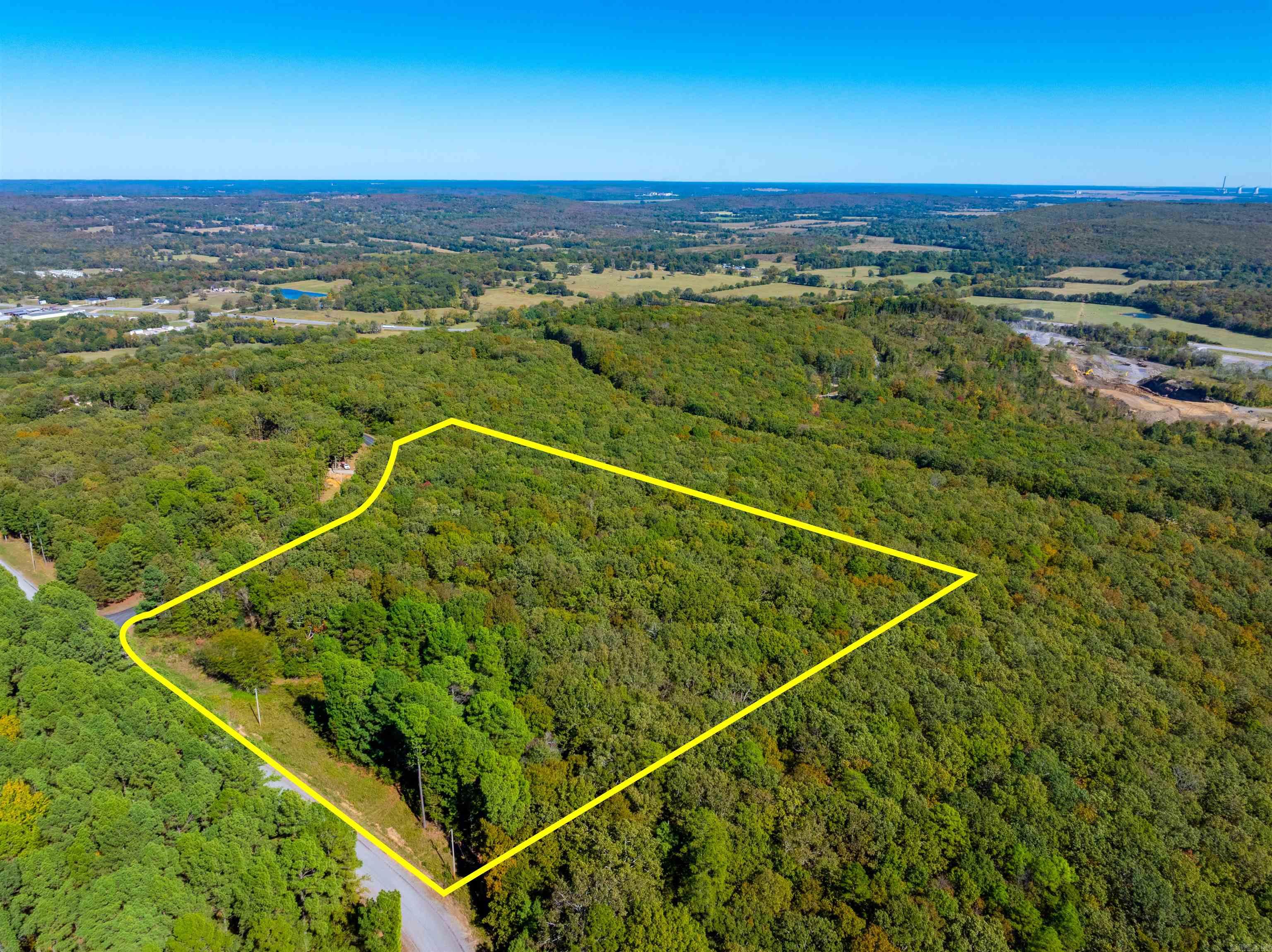 This is not just “another piece of land”—it’s your blank canvas in an established and upscale neighborhood. The subdivision setting means you don’t have to compromise on community standards, curb appeal, or resale value. At the same time, the acreage gives you freedom and space rarely found at this size in a subdivision and just minutes from Southside Schools.  Whether you're thinking of a private estate, a family compound, or simply land to enjoy and build when you're ready — this tract fits all of that.  From the moment you drive in the one-way entrance and wind through the trees, you’ll understand the appeal: it’s peaceful, the terrain varied and interesting, the potential enormous. The land has some building requirements that are attached in documents. The plat of the subdivision is also in the attached documents.   If you want to build in a well-cared-for and quiet area, this is the perfect place for you!