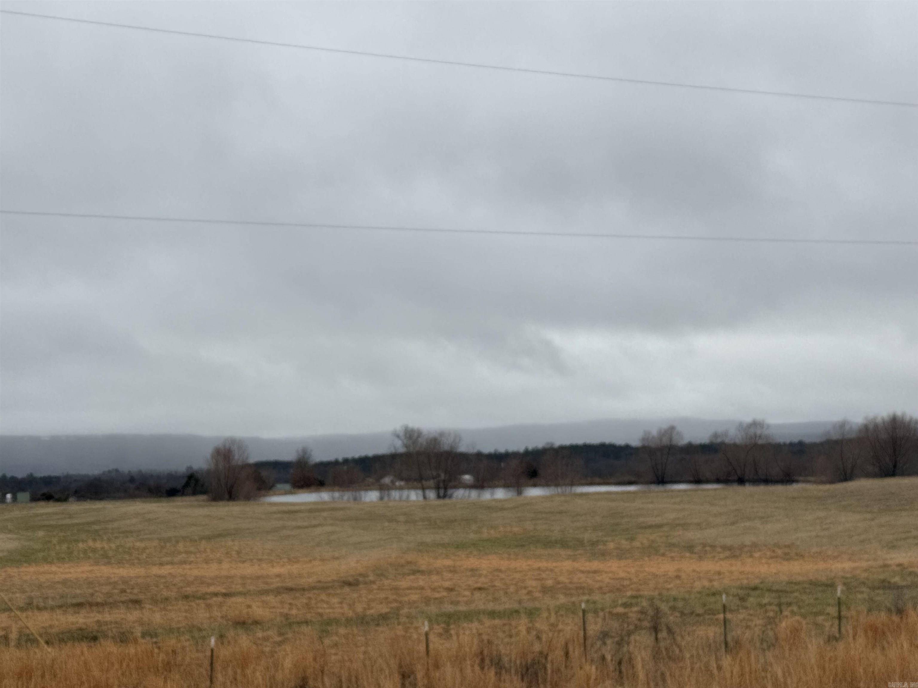 Beautiful 35 ACRES (SUBJECT TO SURVEY FOR EXACT ACREAGE) of rolling pastureland in Greers Ferry and 2 ponds. Lake access and marina less than 2 miles away. City park within walking distance. So many possibilities for this property! No mobile home park. (A Mobile home is allowed)