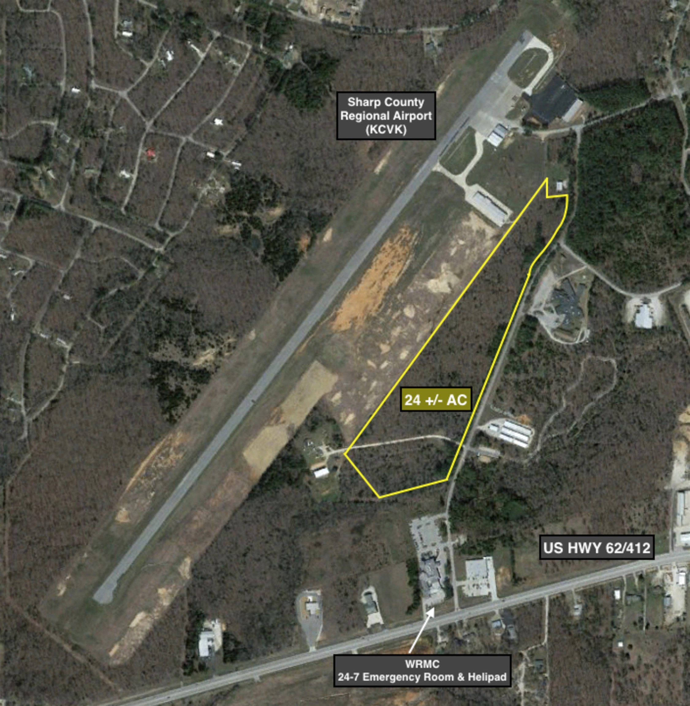 Excelllent Development Potential with Great Location! 24 +\- Acres of flat undeveloped commercial land. Located in Cherokee Village, Arkansas. Zoned commercial with water, sewer, and electric available. Adjoining Sharp County Reginal Airport. Easy access to US Highway 62/412 via Hospital Drive. Plus, at that intersection is the 24-7 Emergency Room, Hellipad and Medical Clinic.