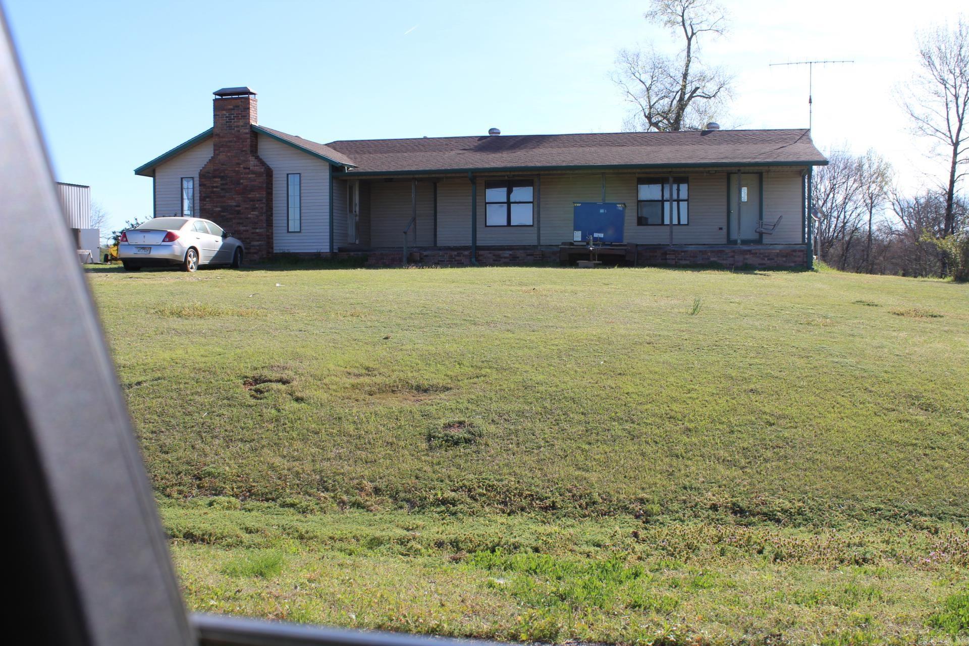 TWO HOMES SITUATED ON APPROX. 3.58 ACRES. (804 Old Center Point Rd. is a 4 bed, 1 full bath with approx. 2022 Sq. Ft. of living space.  Central A/C & Heat.) (808 Old Center Point Rd.  is a 2 Bed, 1 bath with approx. 840 Sq. Ft. of living space.  NEEDS TLC). PROPERTY HAS STORM SHELTER