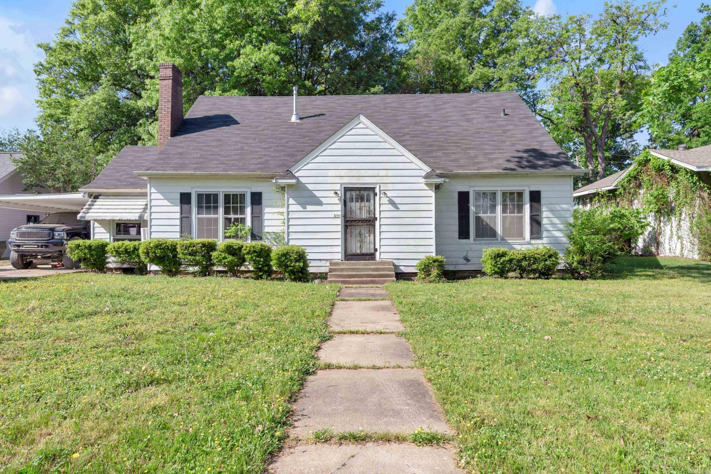 Opportunity awaits at 506 Home St. in Marked Tree! This spacious 4-bedroom, 2-bath home offers 3,029 appraiser-verified square feet and endless potential for the right buyer. Built in 1944, the property is full of character and ready for an investor or renovator looking to bring it back to life. Inside, you'll find a flexible layout that includes a second living area currently being used as a 5th bedroom, providing plenty of space to reimagine and customize. Enjoy the added charm of a screened-in porchperfect for relaxing evenings. Whether you're looking for your next investment project or a property with room to transform, this one is packed with possibilities!