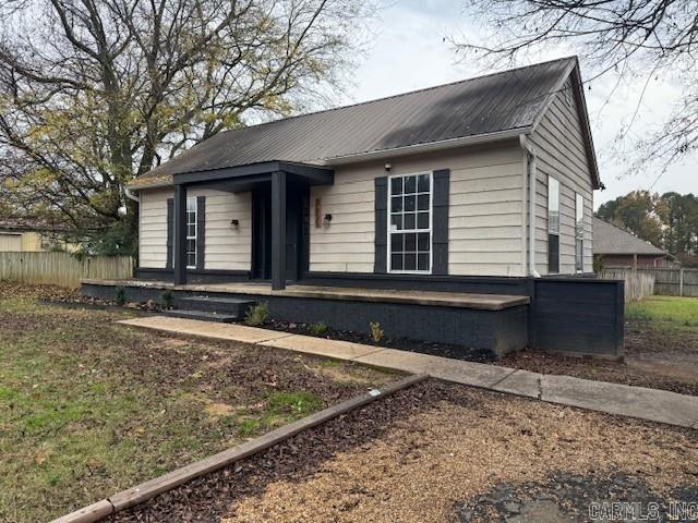Highly desired priced home in West Conway across from Conway Country Club, possible multi-family development. 880 sq ft home, .45 acre large fenced lot, large rear deck, 2 bedroom 1 bath with a bonus room that was used as a bedroom. Metal roof, newer HVAC. Very rare to find a home at this price in West Conway! Motivated seller!