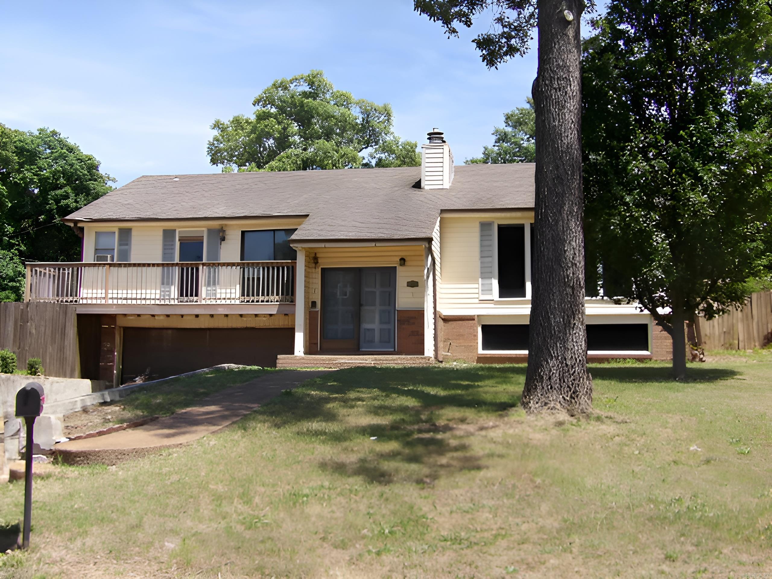 This multi-level home offers a rare opportunity to secure a property just moments from the Jonesboro Country Club. The location alone delivers exceptional long-term value, mature trees, and the convenience of being close to premier golf, dining, and social amenities. Inside, the home features a versatile multi-level layout, including a basement that expands your options for additional living space, recreation, storage, or a future guest suite. Large windows bring in natural light, and the existing footprint provides for a thoughtful renovation. This property is ideal for buyers who recognize the power of location and the return potential that comes with updating a home in a high-demand neighborhood. Whether you're planning a full modern refresh or a strategic cosmetic upgrade, the upside is undeniable. With its superb setting near the Country Club and a layout ready for transformation, this home is a smart investment for anyone looking to build equity in one of Jonesboro's most established and sought-after areas. ** Agents see remarks and download the form for entry first.