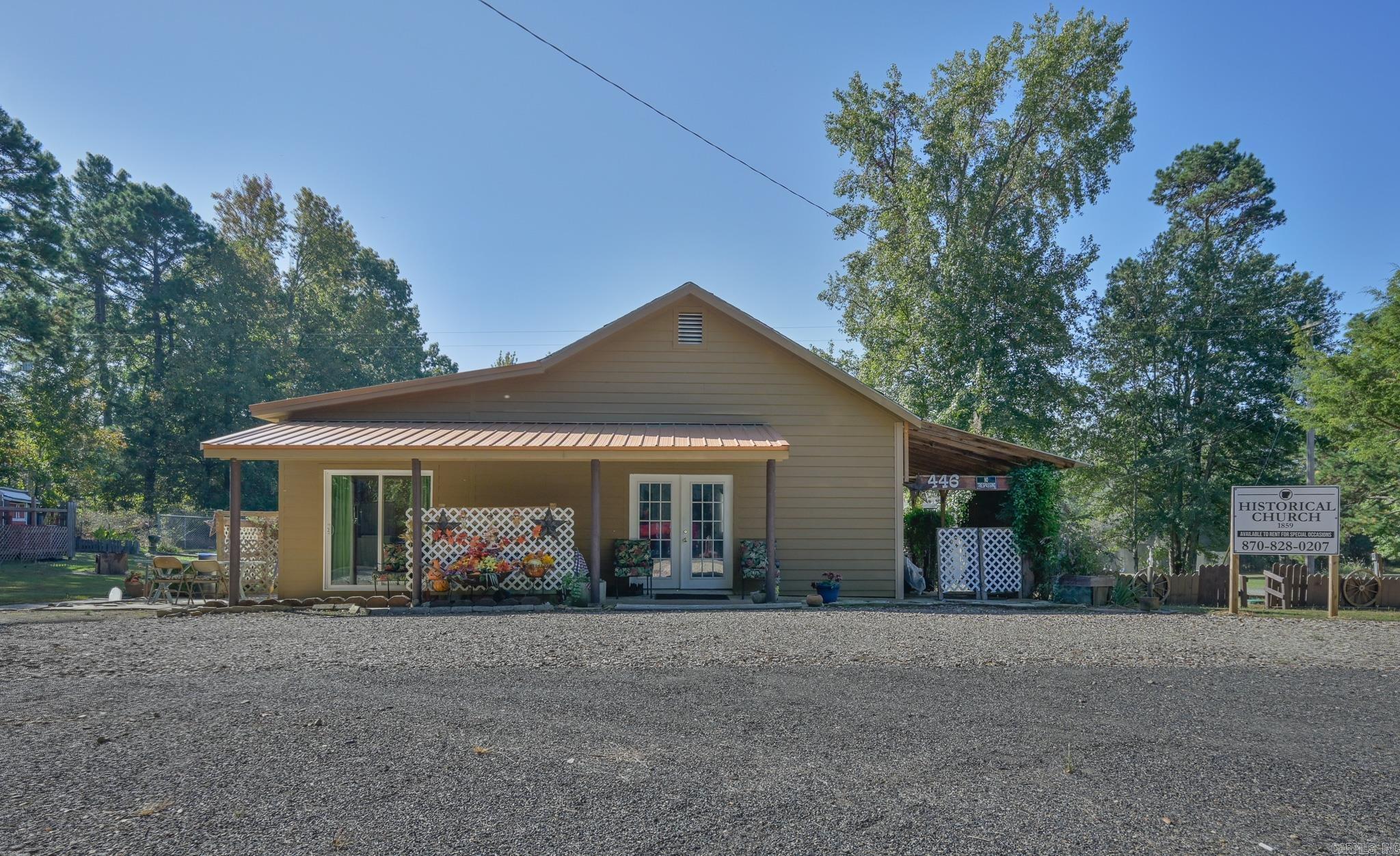 Would you like to own a piece of history? Looking to invest in a vacation rental venue? This charming, old yet sturdy church building, built in 1859, has been transformed, complete with an added kitchen and bathroom. A Cozy hearth area and stovepipe are ready to install your preferred heating unit. The .88 acre setting is in very peaceful surroundings, where pathways lead to a nicely landscaped, shaded sitting garden as well as a vegetable garden. There are quaint outbuildings, including an old bathhouse, storage buildings, a wellhouse with a new pump, chlorinator, and a new holding tank. There is plenty of space for RV parking. Easy access to ATV trails.