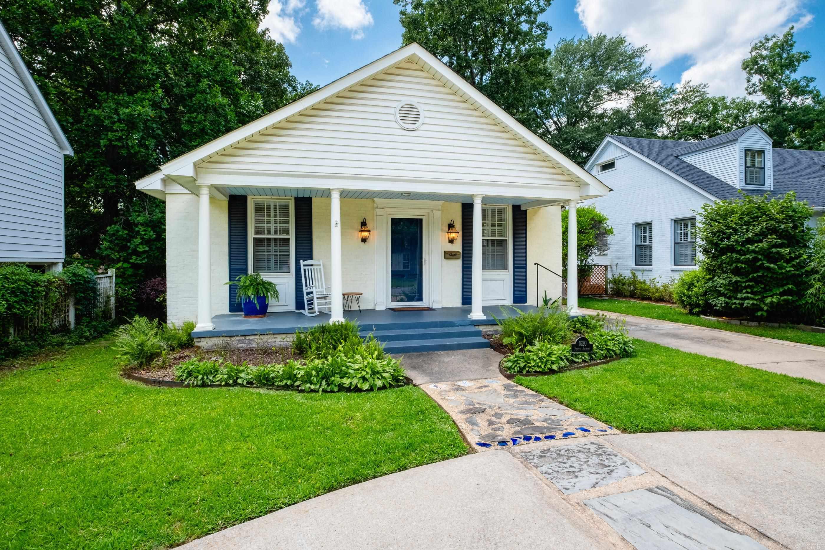 Charming Heights home, beautiful hardwood floors, thoughtfully remodeled floorplan that lives like a one-level! Open living and dining space, three bedrooms on the main level, including a large primary suite with luxurious bath and enormous professionally designed closet, plus a nice upstairs suite ideal for guests, office, or media room. Kitchen has newer stainless appliances, opens to a mudroom and a fantastic screened porch connects to the oversized one car garage with storage. Parking available in circle drive. Lovely back patio with low maintenance backyard, perfect for relaxing and entertaining. Convenient location with easy walk to Heights restaurants, shopping, Forest Park Elementary School. Agents please see remarks.