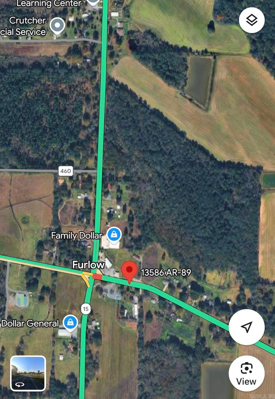 MOBILE HOMES WELCOME, NO RESTRICTIONS, AND OUT OF CITY LIMITS.  5-acre opportunity at the intersection of AR 89 and Highway 15, just off the freeway near Furlow.   CALL AGENT FOR MORE DETAILS OR TO SUBMIT OFFER. 501-271-9787  A completed survey is already on file, reducing upfront due diligence time and accelerating your path to development. With highway frontage and proximity to major routes, this parcel is well-positioned for growth and long-term value.