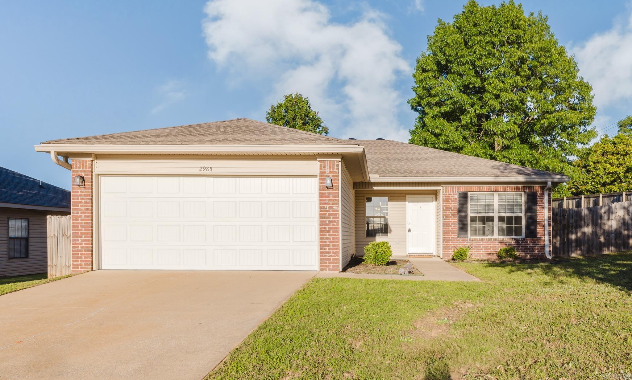 Move-in ready 3 bedroom, 2 bath home featuring a desirable split floor plan with a spacious layout and separate laundry room. Situated on a large corner lot, this home offers a fully fenced backyard perfect for pets, play, or entertaining. Enjoy low-maintenance living with no carpet throughout. Great location and ready for its next owner!