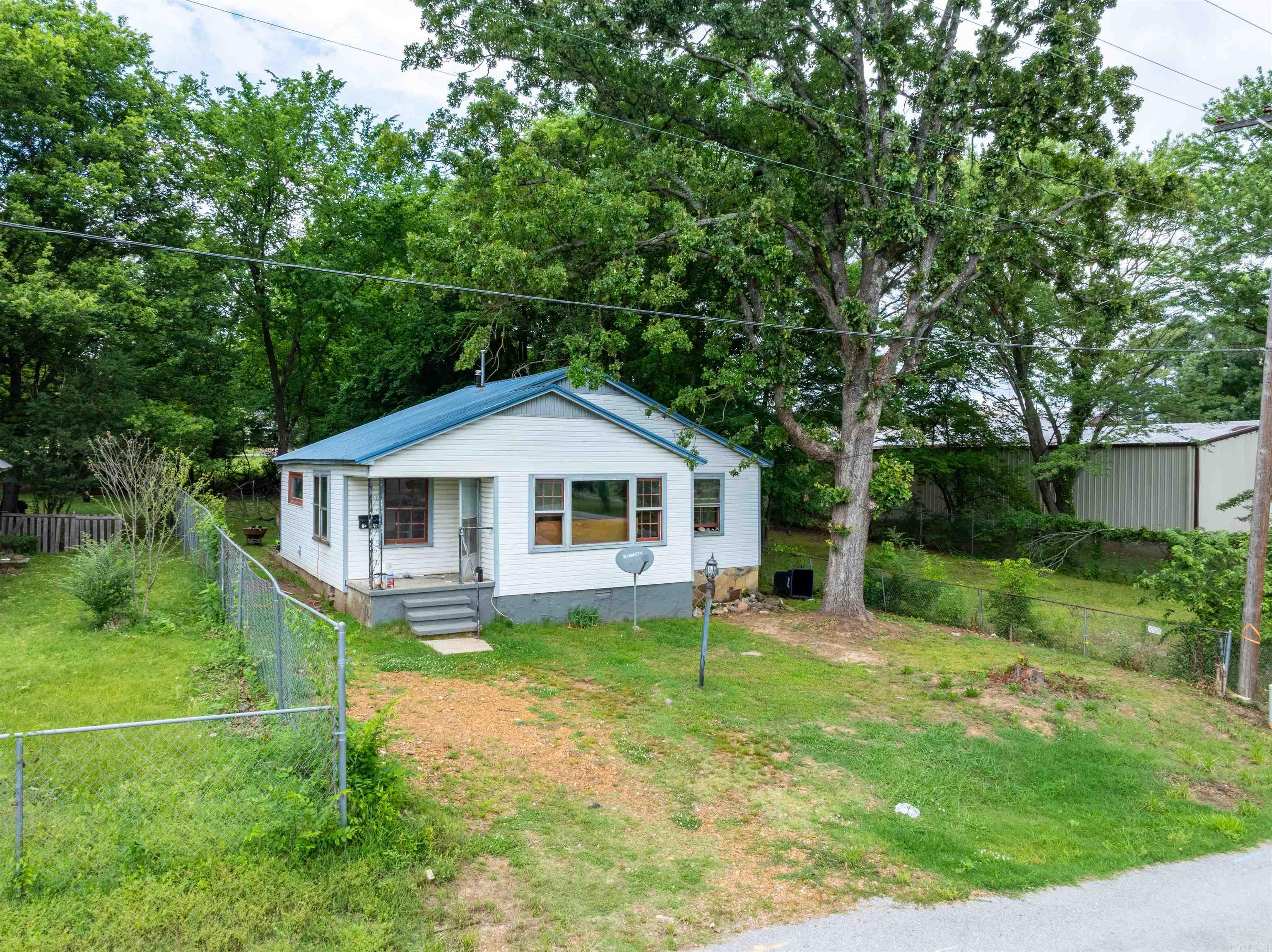 Hard-to-find location. Endless possibilities. Affordable opportunity.  Welcome to 1525 Grays Avenue in Batesville, Arkansas — a charming and affordable opportunity located right in the heart of town. Whether you're searching for a starter home, investment property, rental opportunity, or a place to make your own, this 2-bedroom, 1-bath home offers convenience, potential, and value in a location that’s hard to beat.  Situated within walking distance of White River Medical Center, shopping, restaurants, schools, and local businesses, this property provides the comfort of in-town living with easy access to everything Batesville has to offer. The home features an efficient layout, comfortable living spaces, and a private backyard perfect for relaxing or enjoying outdoor time.