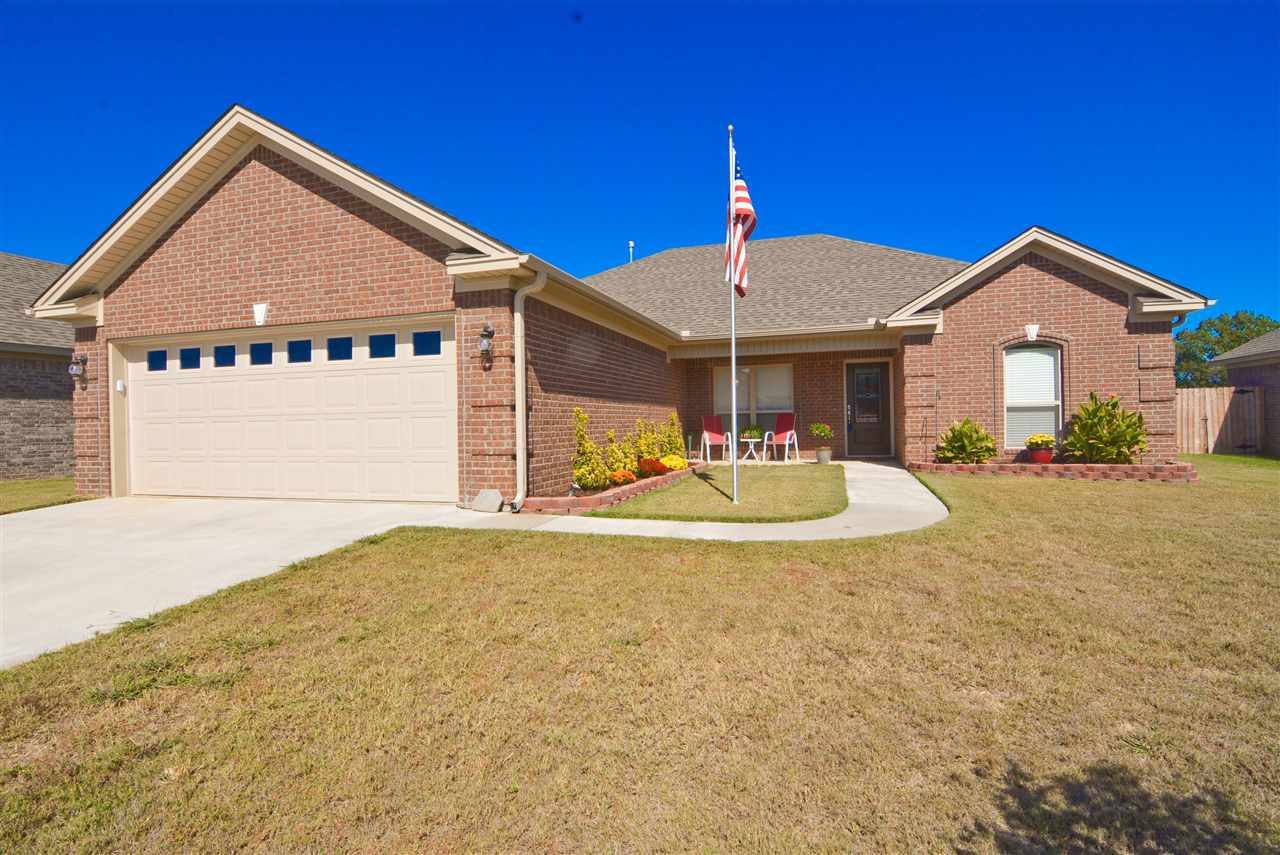 Nearly New 3 bedroom brick home close to front gate of base.  Lovely stained wood cabinets with granite counter tops. Double pan ceilings, gas fireplace, wood and tile flooring. 9 x 12 workshop, Instant hot water heater, custom blinds, stainless steel fridge. Ten year warranty  on furnace transferrable to new owner.