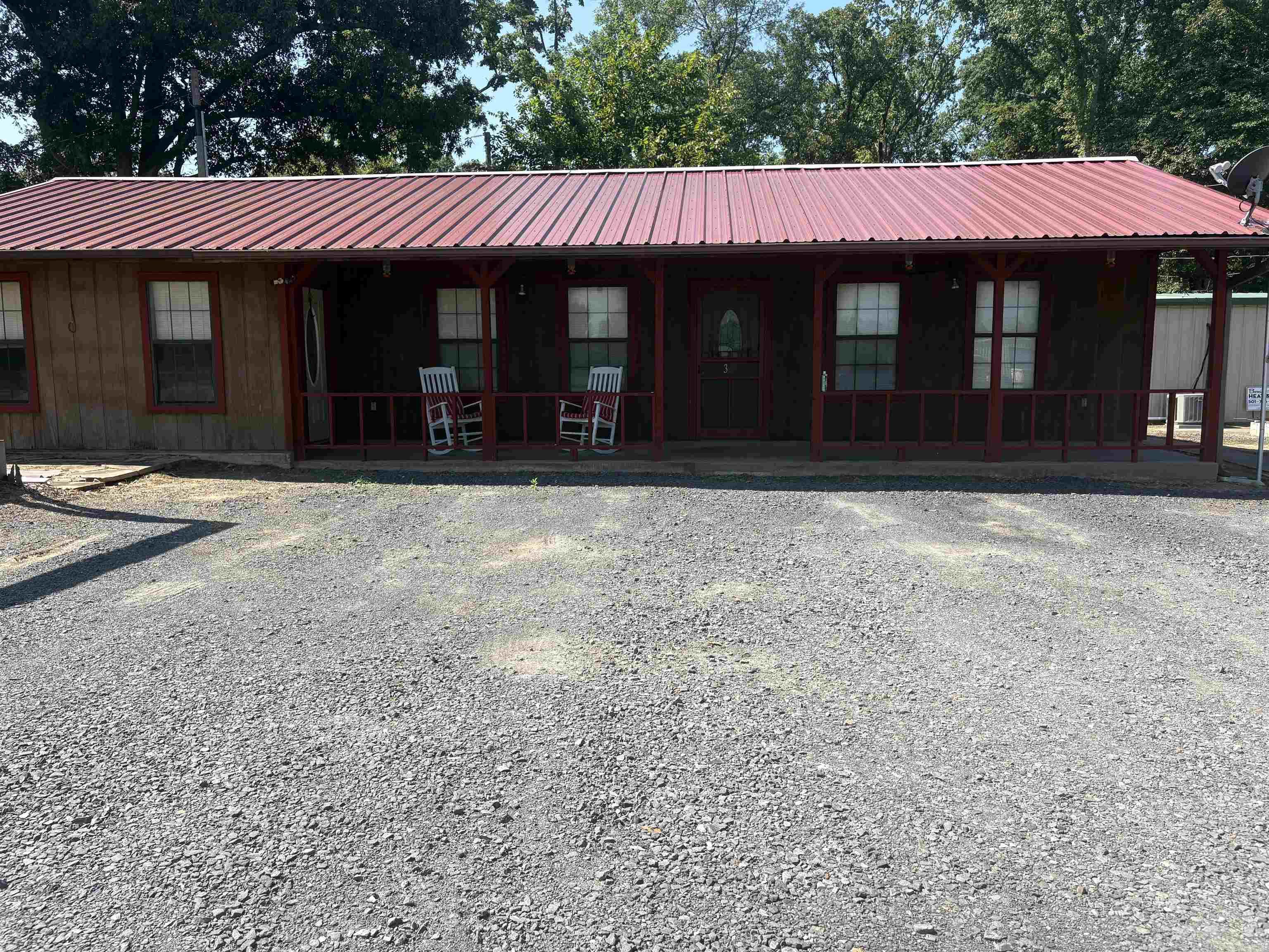 This 2 bedroom, 2 bathroom house offers lots of space and versatility with no subdivision restrictions. This unique home has been thoughtfully updated with a new roof installed in late 2022 and a new hot water tank in 2025. The property features a gravel driveway for easy access and low maintenance.  One of the best features of this home is that it is equipped with a fully mother in laws quarters, built in 2025 within half of the shop. This separate living space includes its own heat and air and hot water tank. It also includes a hookup for a stove. This makes it ideal for extended family, guests, or potential rental income.  In addition to the living spaces, the property also includes a shop, offering a lot of space for storage, hobbies, or work needs. It also includes an open air carport which could be built in. If you're looking for flexibility, recent upgrades, and property outside of city limits, this one is a must-see!