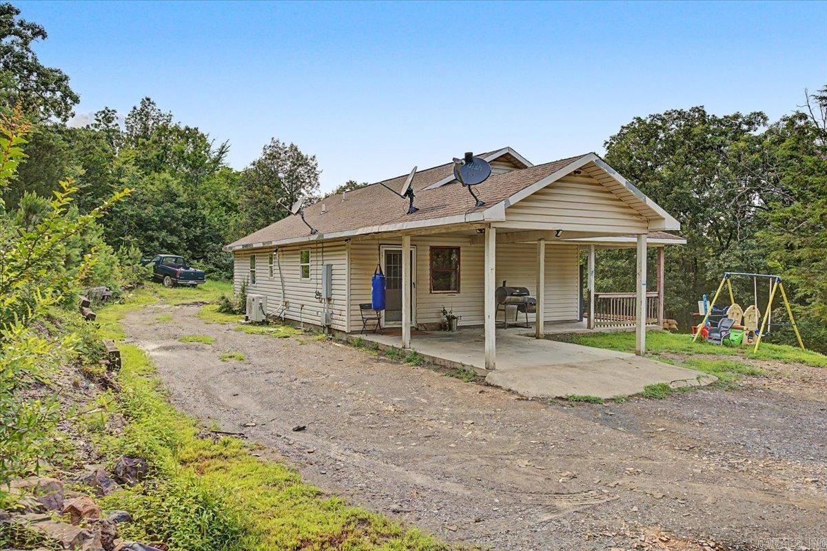 Welcome to your brand-new dream home at 403 Polk 178, Mena, AR 71953! Situated on 3 beautiful acres, this newly constructed 3-bedroom, 2-bathroom home offers approximately 1,200 square feet of thoughtfully designed living space, combining modern comfort with peaceful country living.  Step inside to discover a bright, open floor plan with stylish finishes, a spacious kitchen perfect for entertaining, and comfortable bedrooms designed for everyday living. The primary suite features a private bath, creating the perfect retreat after a long day.  Outside, you'll enjoy plenty of room to spread out with a detached garage, carport, and three acres of land offering endless possibilities for gardening, recreation, animals, or simply enjoying the quiet surroundings. Whether you're looking for your first home, a place to retire, or a weekend getaway in the Ouachita Mountains, this property delivers the perfect blend of privacy, convenience, and modern living.  Don't miss this opportunity to own a beautiful new home with acreage just minutes from all that Mena has to offer. Schedule your private showing today!