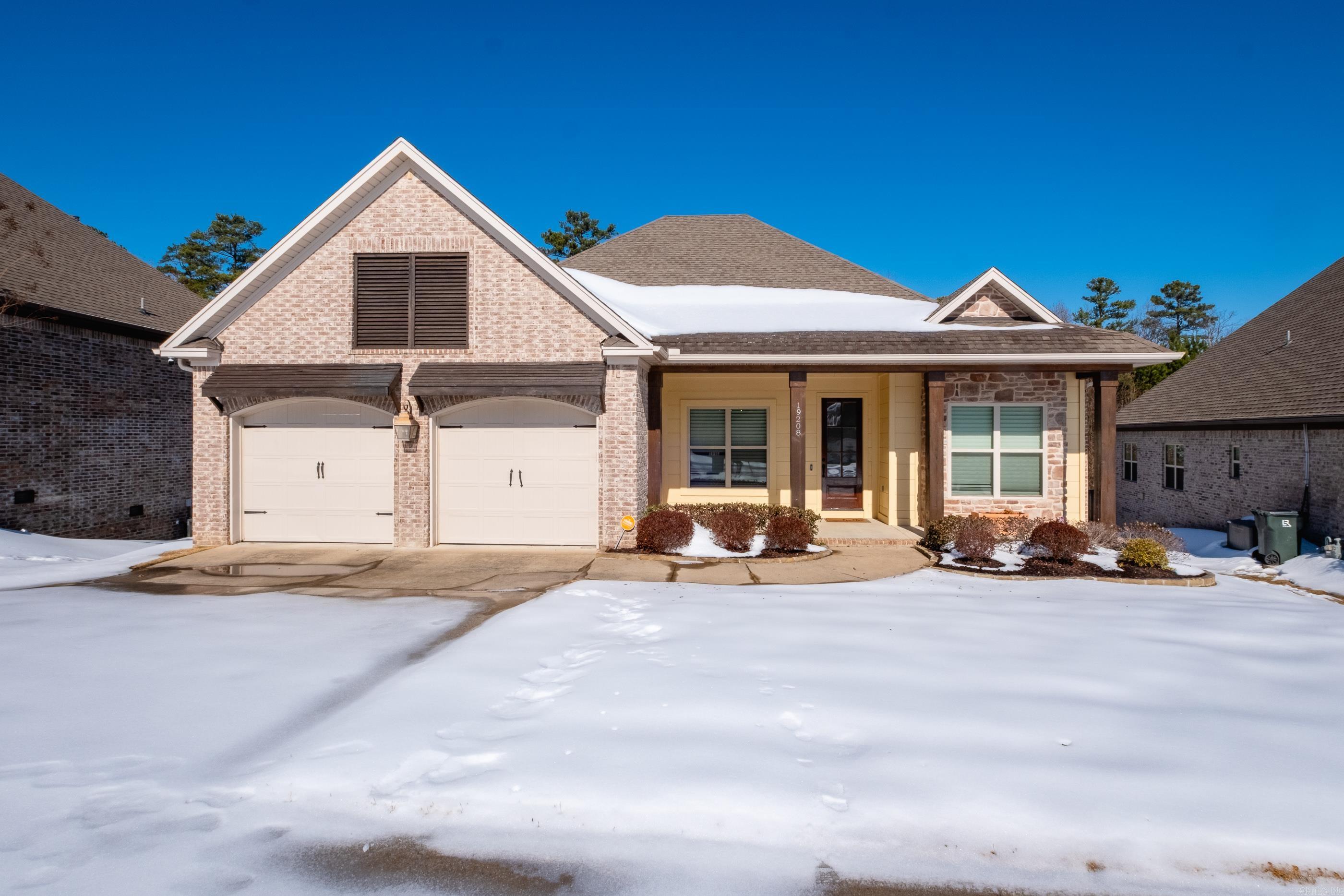 Beautifully appointed single-level home where the family room showcases elegant, coffered ceilings and opens seamlessly to the dining room and eat-in kitchen, complete with a granite-topped bar and rich, dark-stained cabinetry. This home has 9' ceilings throughout, for an open and airy feel, enhanced by abundant natural light and well-placed windows.  There are 4 bedrooms, with a spacious primary suite thoughtfully separated from the additional bedrooms for added privacy. A partially floored walk-in attic offers excellent storage and the potential to be finished into an additional room.   Enjoy peaceful mornings on the screened-in back porch overlooking the green space beyond—an ideal spot for coffee or quiet relaxation. Located just 5 minutes from Chenal Country Club, The Promenade, and Wildwood Park for the Arts.