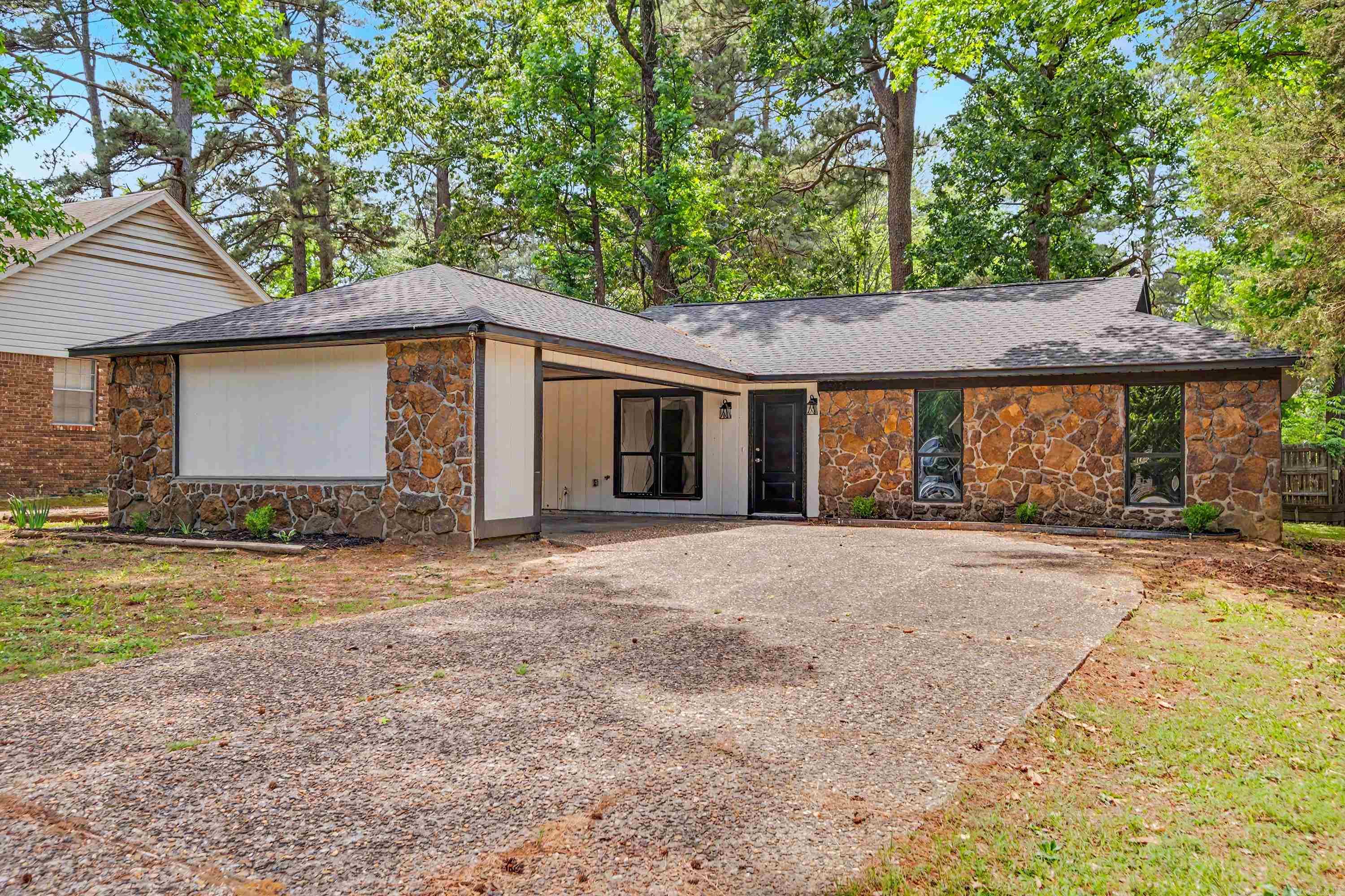 Home has been remodeled, neutral colors, tile flooring throughout home, open and spacious, 3 Bedrooms, 2 Baths, side load parking, great home for large family.