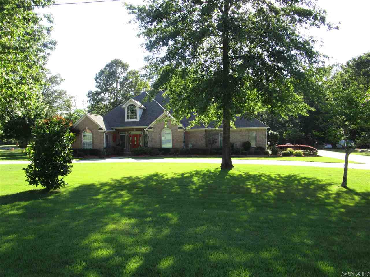 Hurry Hurry its a "10" * All Brick * 3BR * 3BA * Office & Den * Fireplace with gas logs & remote started  * 10' pan ceiling in LR * Master 9' in rest of house * Whole house generator auto on & off * Extra landscape sod * inground sprinkler system* kitchen cabinets pull out drawers * 30x40 shop * 110 220 wiring * plumbing for adding a bath * steel safe room in garage * Heavy crown molding * Hardwood and Tile Floors only 1 BR carpet