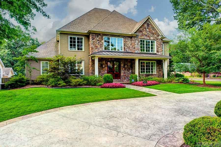 Lovely custom home built with generous sized rooms.  Gracious foyer, his and hers offices, main level master bedroom , banquet sized dining room.  Of of the guest bedrooms has sitting room.  Huge floored attic, spacious rear patio overlooking large water feature.