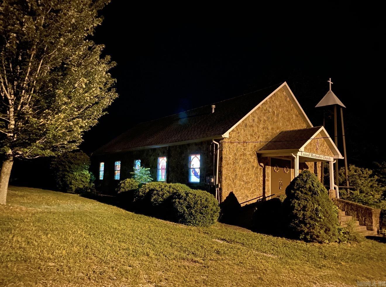 One of a kind converted church situated on 1 acre+/-, offering a unique blend of character, space, and versatility. This thoughtfully adapted property features a large living area, spacious rooms, and updated bathrooms, providing flexibility for a variety of uses.  The beautiful stained glass windows serve as a standout feature, filling the space with natural light and adding timeless charm you won’t find in traditional homes. Ramp access for ease of entry and functionality.  Outside, the expansive 1-acre lot offers ample parking and plenty of room for outdoor enjoyment, gatherings, or future improvements.  Whether you’re searching for a primary residence, weekend retreat, or investment opportunity, this distinctive property presents endless possibilities.