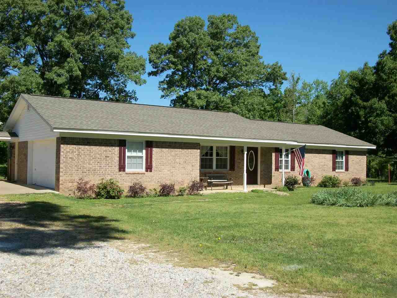 Gorgeous country home, totally remodeled with great attention to detail.  10.2 Beautiful acres, fully fenced for horses, 3 stall stable plus sheds, and arena space (panels do not convey).  New HVAC (2013), hardwood and tile, WBFP w/gas logs, open floor plan.  Peaceful country setting.  Call today for your preview of this wonderful home.  AGENTS SEE CONFIDENTIAL REMARKS