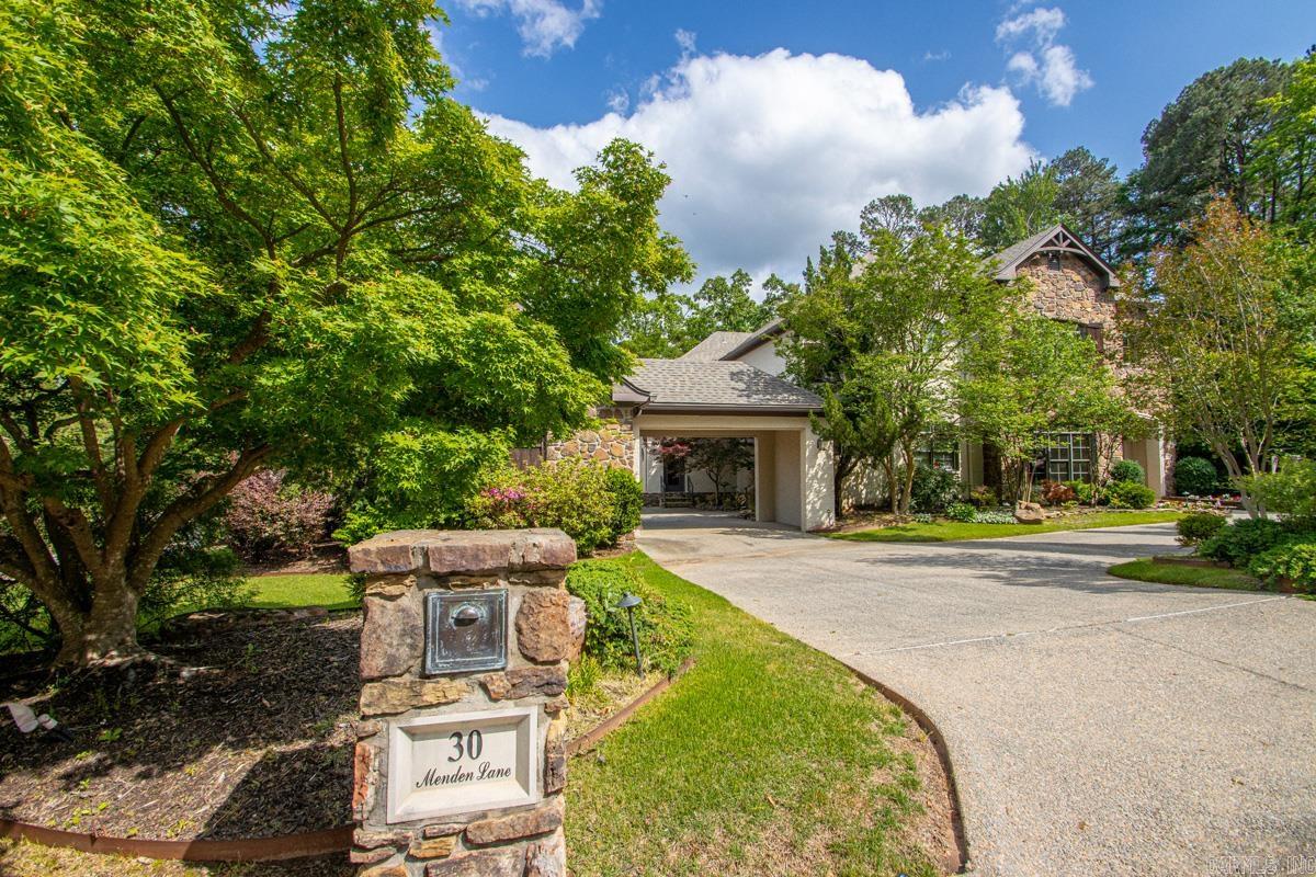 Experience elegance at its best in this impressive Maisons neighborhood home showcasing spacious rooms and refined architectural details throughout in Chenal Valley.  With 5 bedrooms, 4 baths (1 is a jack-n-jill), 2 half baths, a movie room, and an expansive flex room, the layout offers exceptional comfort and flexibility.  Beautiful wood accents enhance the home's warmth and sophistication, creating an atmosphere of timeless luxury.  Cozy up by the fire showcased in a real brick wall adjacent to the expansive kitchen or enjoy the beautiful Arkansas weather on the screened-in patio overlooking the back yard.  Designed for those who appreciate space, style, and superior craftsmanship, this residence is ideal for elevated everyday living and memorable entertaining.  New roof 9/2020, HVAC replaced in 2018.  The Viking 6 burner w/ griddle gas cooktop and double ovens, Sub-Zero refrigerator and beverage fridge round off the impressive kitchen.  You will also love the 3 car garage with a Porte-cochere.  Come see the rest of this beautiful home.  See Remarks!